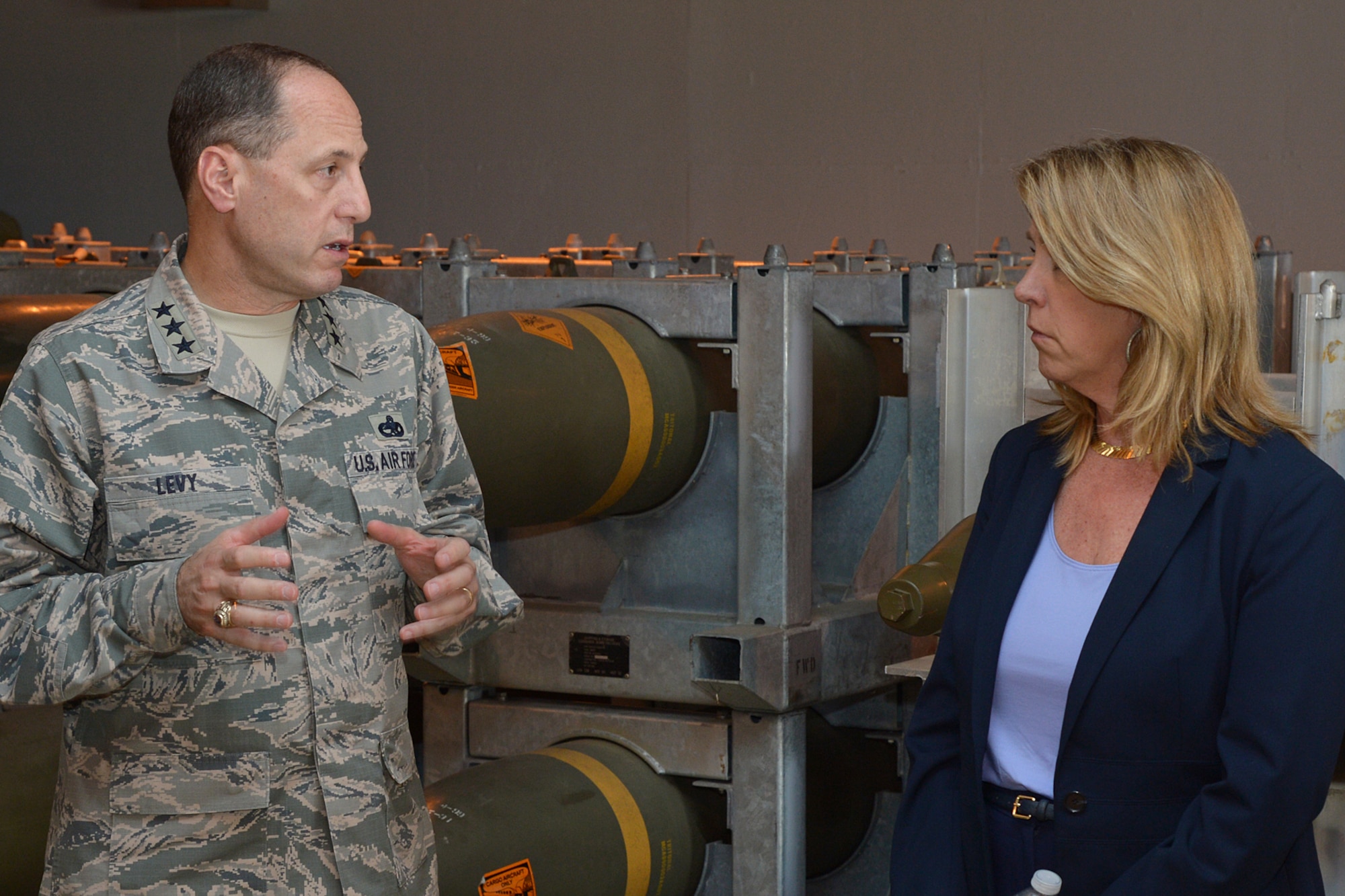 Secretary of the Air Force Deborah Lee James talks with Lt. Gen. Lee K. Levy II, the Air Force Sustainment Center commander, about Standard Air Munitions Package (STAMP) issues during her visit to Hill Air Force Base, Utah, July 23, 2015. STAMP is a munitions package meant to resupply warfighters. (U.S. Air Force photo/Alex R. Lloyd)