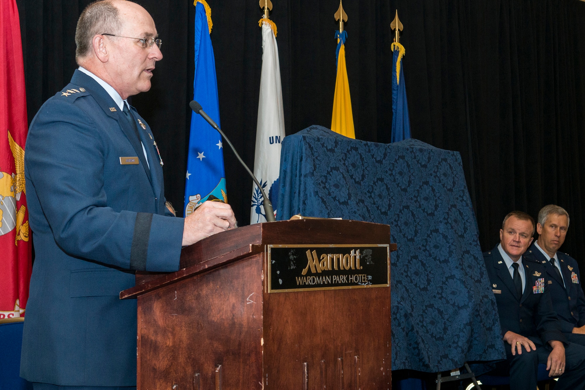 The Chief of the Air Force Reserve Lt. Gen. James Jackson addresses the audience during the Reserve Officers Association National Convention in Washington D.C. Jul. 27, 2015.  Jackson spoke about the importance of our 21st century deterrence mission and how honored he is to provide that capability to the Air Force before he presented the painting "Deterrence on Demand" to Brig. Gen. Thomas Clark, the Mobilization Assistant to the Assistant Chief of Staff for Strategic Deterrence and Nuclear Integration, Headquarters U.S. Air Force. (U.S. Air Force photo by Master Sgt. Gregory Steele)  

