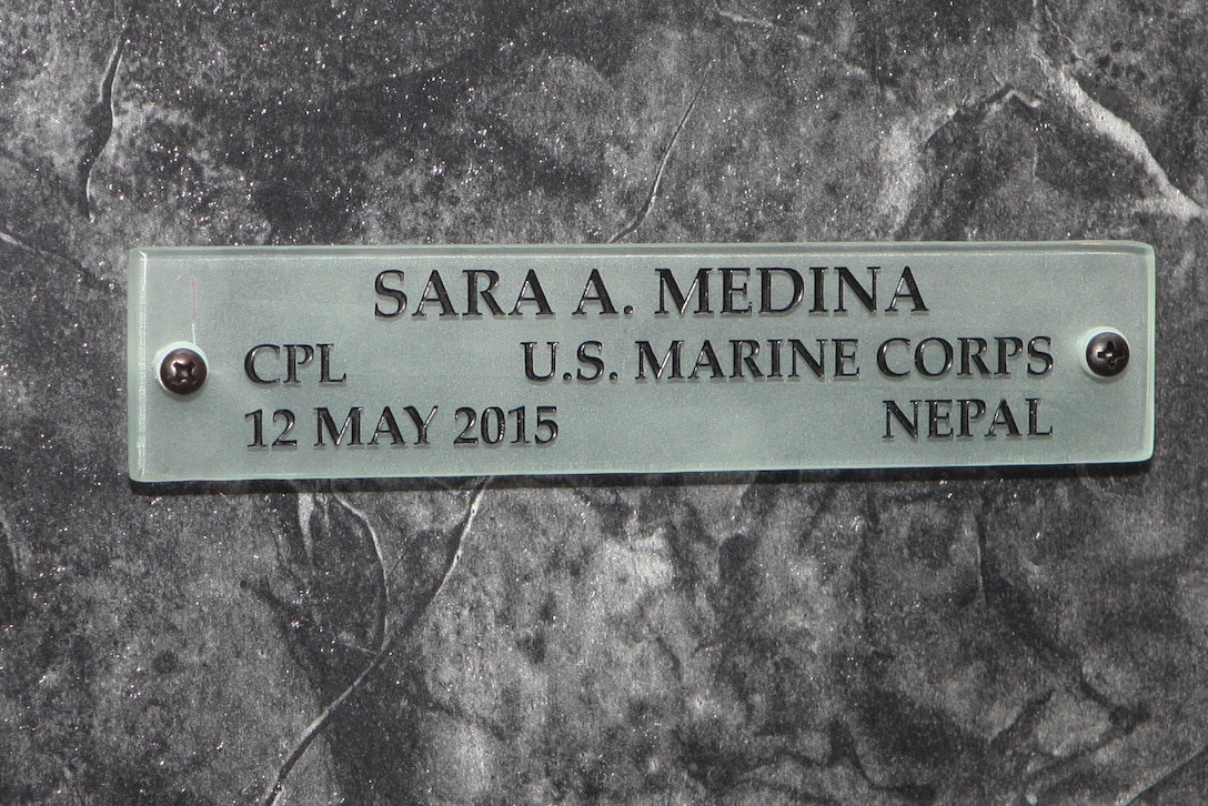 Cpl. Sara Medina’s name is mounted July 27, 2015, in the Hall of Heroes at the Defense Information School at Fort George G. Meade, Md. Medina, along with Lance Cpl. Jacob Hug, had their names mounted to the Hall of Heroes display at DINFOS during a ceremony honoring their service after losing their lives in a helicopter crash during relief efforts in Nepal. 