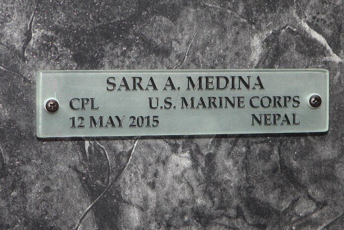 Cpl. Sara Medina’s name is mounted July 27, 2015, in the Hall of Heroes at the Defense Information School at Fort George G. Meade, Md. Medina, along with Lance Cpl. Jacob Hug, had their names mounted to the Hall of Heroes display at DINFOS during a ceremony honoring their service after losing their lives in a helicopter crash during relief efforts in Nepal. 
