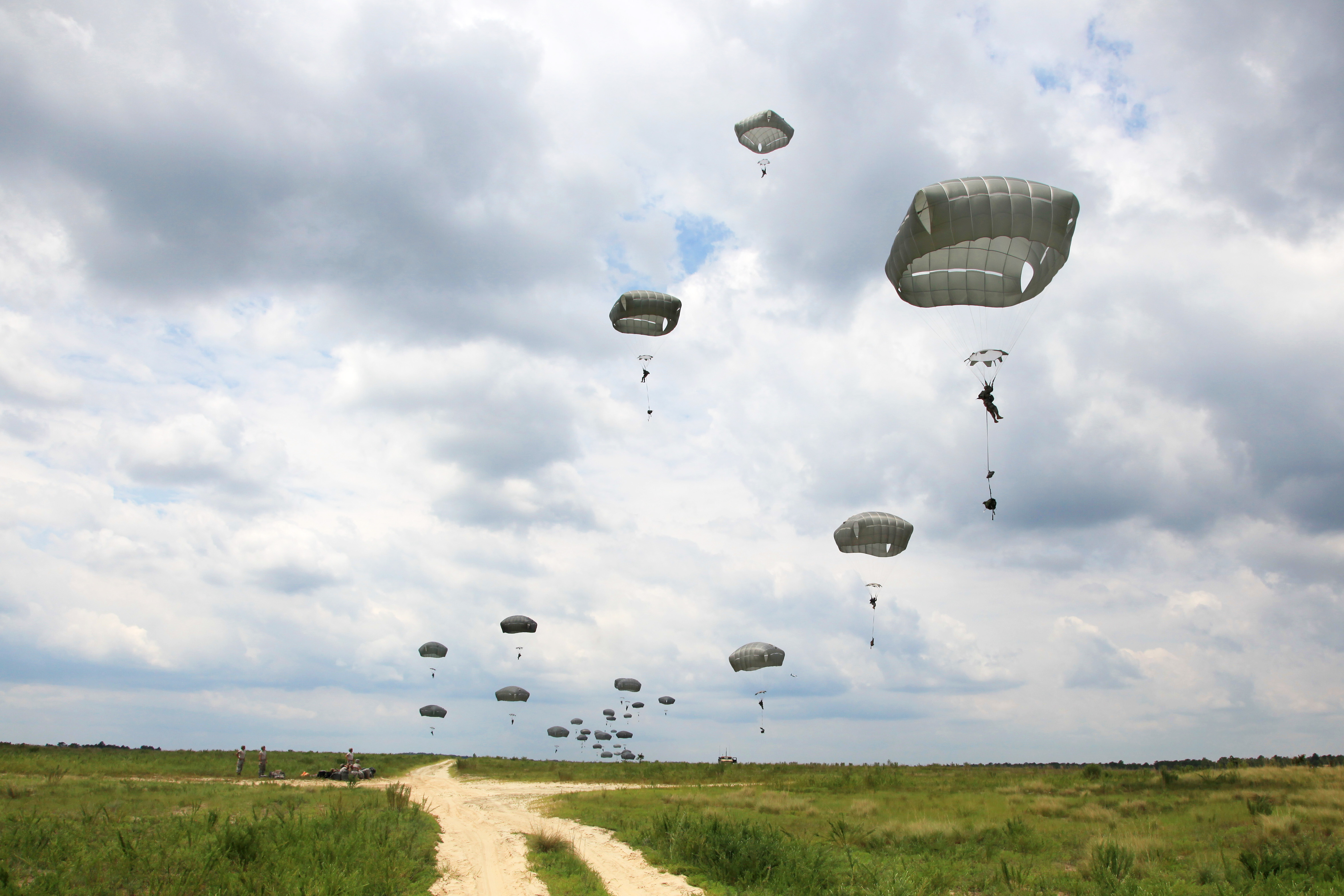 Paratroopers descend toward Salerno drop zone during a mass tactical