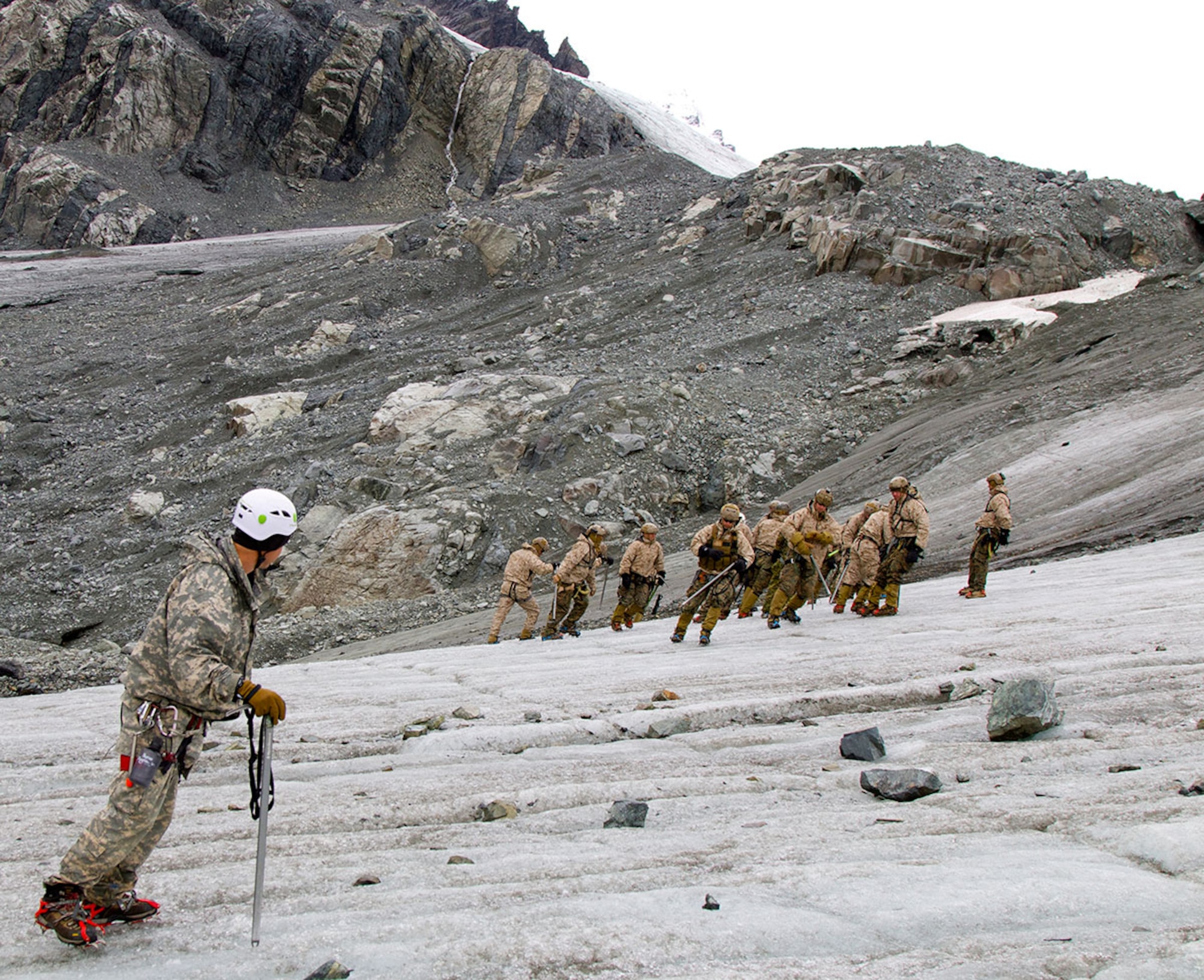 From the snow-kissed mountains to the icy rumblings of melting glaciers, Marines from 2nd Platoon Force Reconnaissance Company, 1st Reconnaissance Battalion, Camp Pendleton, Calif., along with instructors from U.S. Army Alaska’s Northern Warfare Training Center conducted military alpine operations at Black Rapids Training Site and Gulkana Glacier July 18, 2015. (Photo by Staff Sgt. Sean Callahan, USARAK Public Affairs)