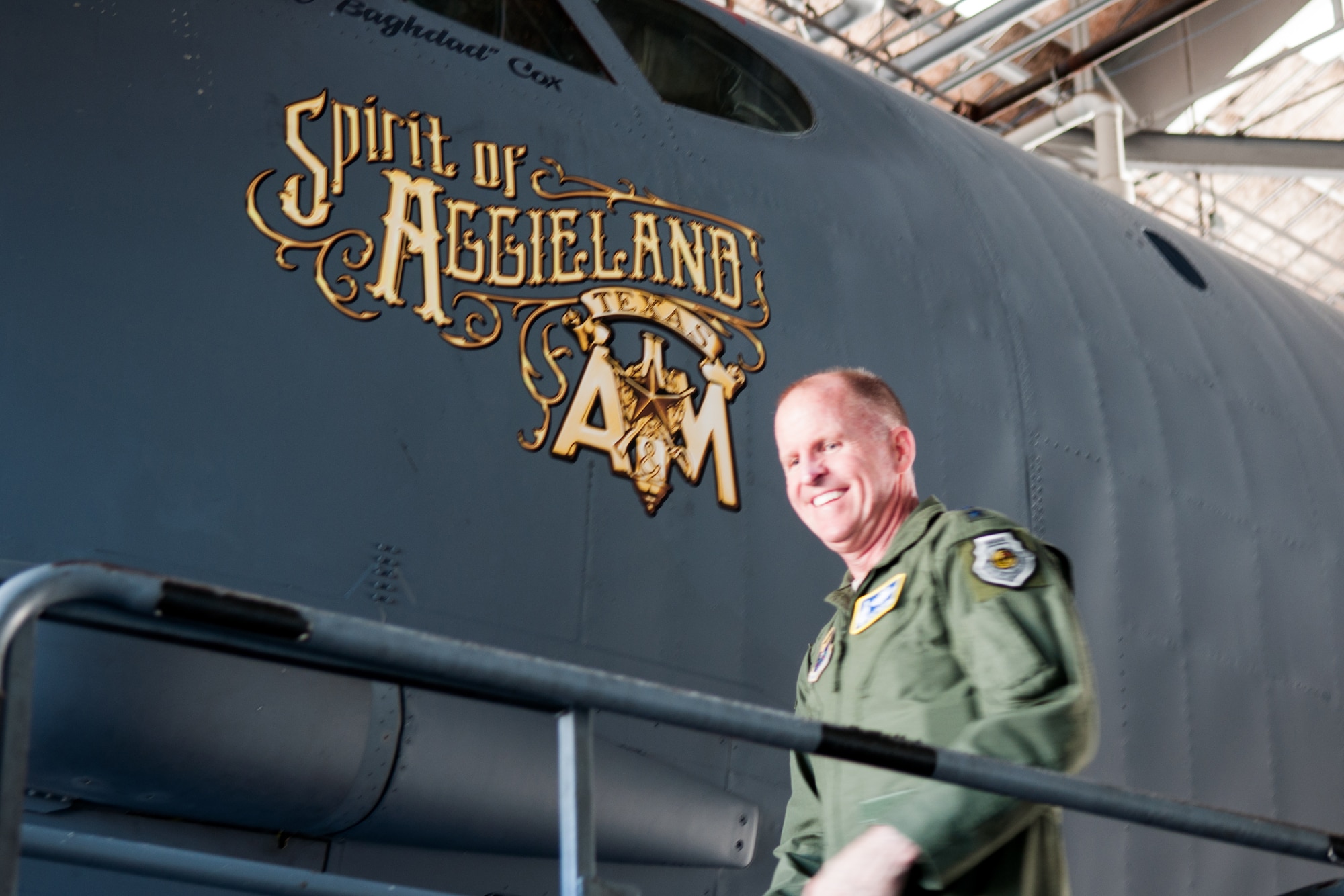 U.S. Air Force Lt. Gen. Stephen Wilson, Commander of Air Force Global Strike Command, is shown the new nose art on the flagship plane of the 307th Bomb Wing on the day of his final flight as commander of AFGSC. "The Spirit of Aggieland" It is dedicated to former and future cadets that graduated from Texas A&M University's Corps of Cadets Program of which Wilson is an alumni. (U.S. Air Force photo by Master Sgt. Dachelle Melville/Released)