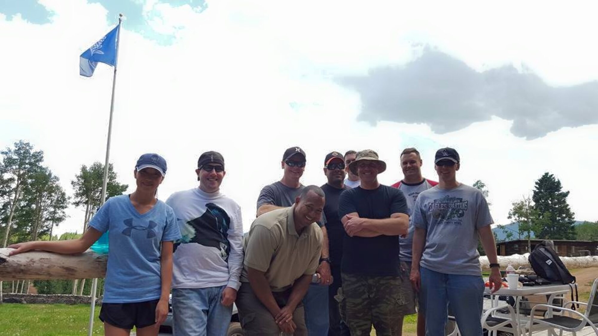 Members of 7th Space Operation Squadron and 3rd Space Experimentation Squadron volunteered to support the Knights of Heroes ranch on June 27, 2015.  The volunteers spent the day moving and burning debris, loading dumpsters, ripping up carpet and cleaning cabins in preparation for the KOH’s 10th annual camp in 2016. (Courtesy Photo)