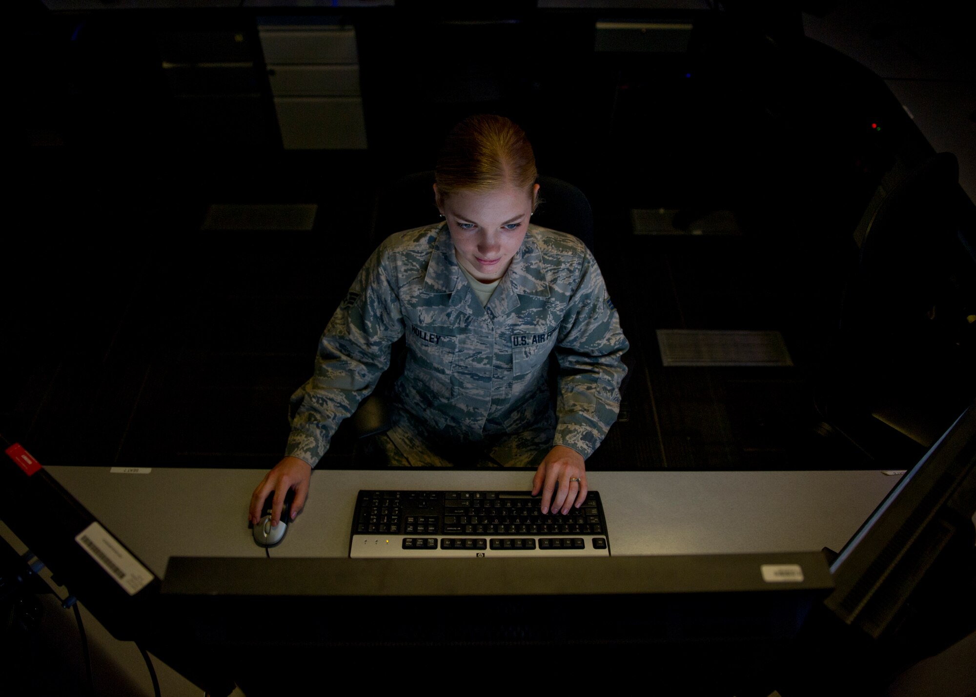 Senior Airman Meaghan Holley conducts mission operations June 30, 2015. Holley was named one of the 12 Outstanding Airmen of the Year in an announcement from the Air Force Personnel Center Monday, July 27, 2015. 