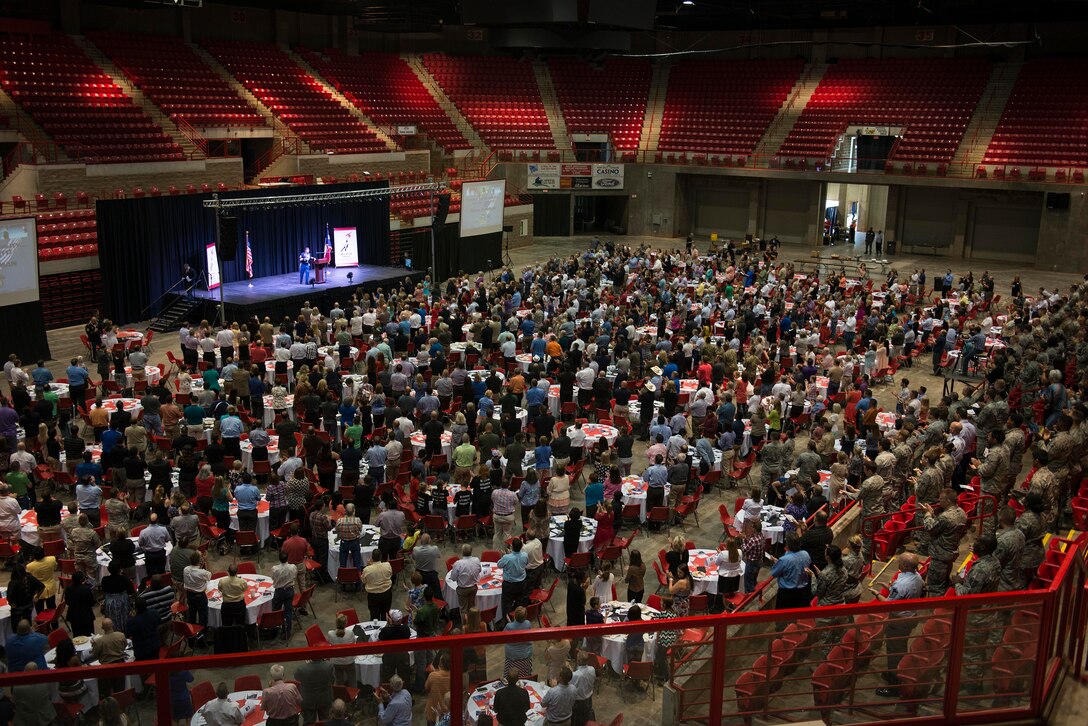 U.S. Air Force Airmen, in attendance with the Wichita Falls community, listen to Medal of Honor recipient retired U.S. Army Master Sgt. Leroy Petry, retired U.S. Army Sgt. 1st Class Dana Bowman and retired U.S. Army Staff Sgt. Shilo Harris speak during the Wichita Falls Leadership Breakfast at the Kay Yeager Coliseum in Wichita Falls, Texas, July 24, 2015. Each of the speakers shared their stories of resiliency and courage with hopes to inspire people to do what is right and overcome their own challenges. (U.S. Air Force photo by Senior Airman Kyle Gese/Released)