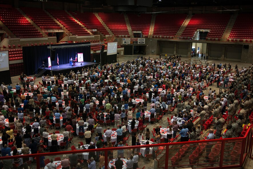 U.S. Air Force Airmen, in attendance with the Wichita Falls community, listen to Medal of Honor recipient retired U.S. Army Master Sgt. Leroy Petry, retired U.S. Army Sgt. 1st Class Dana Bowman and retired U.S. Army Staff Sgt. Shilo Harris speak during the Wichita Falls Leadership Breakfast at the Kay Yeager Coliseum in Wichita Falls, Texas, July 24, 2015. Each of the speakers shared their stories of resiliency and courage with hopes to inspire people to do what is right and overcome their own challenges. (U.S. Air Force photo by Senior Airman Kyle Gese/Released)
