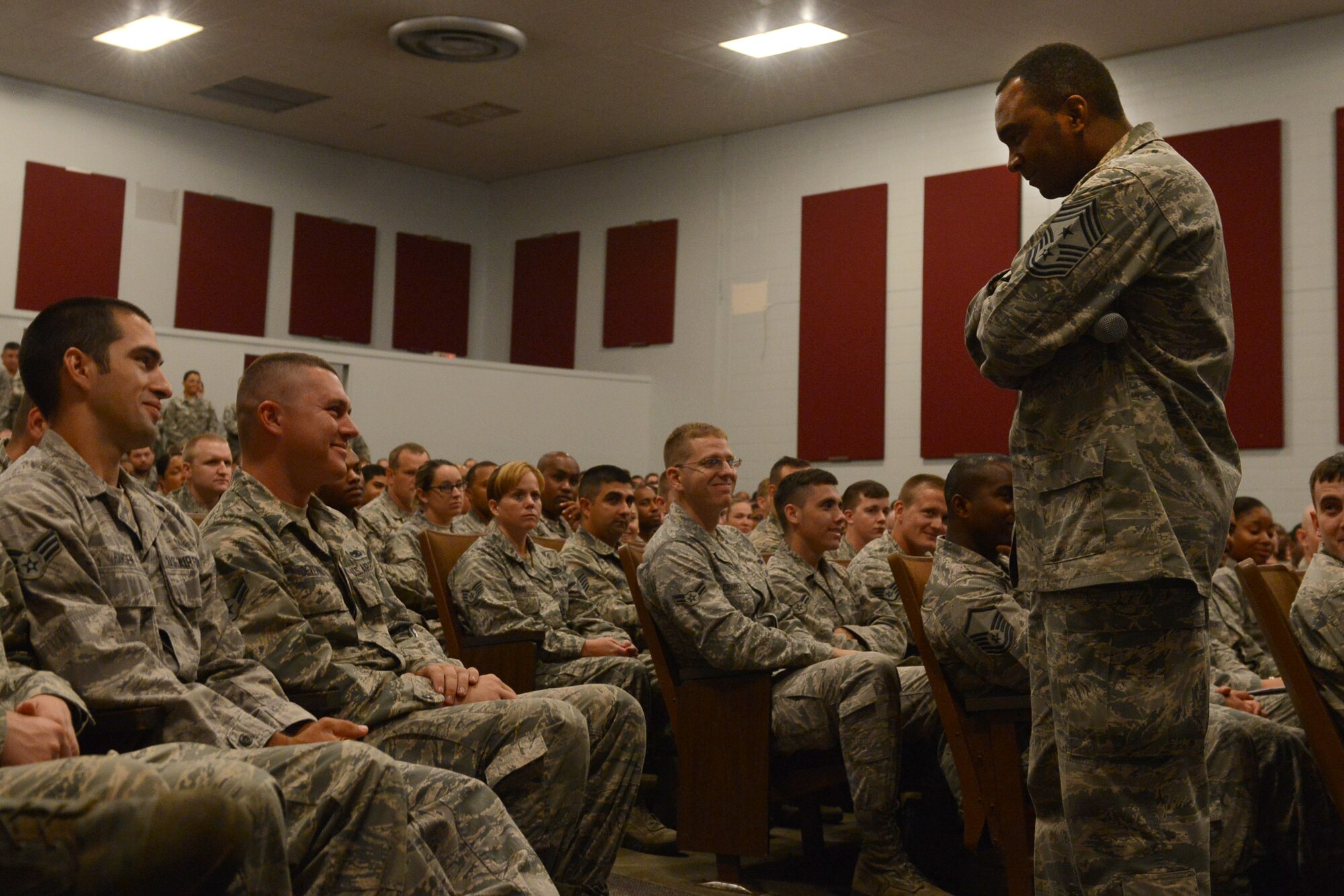 U.S Air Force Chief Master Sgt. Christopher McKinney, 20th Fighter Wing command chief, speaks to Airmen during an enlisted call at Shaw Air Force Base, S.C., July 23, 2015. McKinney encouraged the Airmen to be engaged in maintaining standards and to not only be proud of the uniform they wear and the facilities they have, but to also take care of them and aim to constantly work to be the best and give their all. (U.S. Air Force photo by Senior Airman Diana M. Cossaboom/Released)