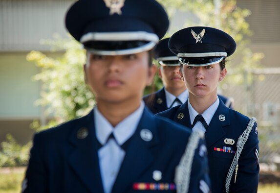 Airman 1st Class Brittany Bunker stands in formation prior to the Honor Guard graduation ceremony June 15 at Eglin Air Force Base, Fla. Approximately 12 new Airmen graduated from the 80-plus-hour course. The graduation performance includes flag detail, rifle volley, pall bearers and bugler for friends, family and unit commanders. (U.S. Air Force photo/Samuel King Jr.)