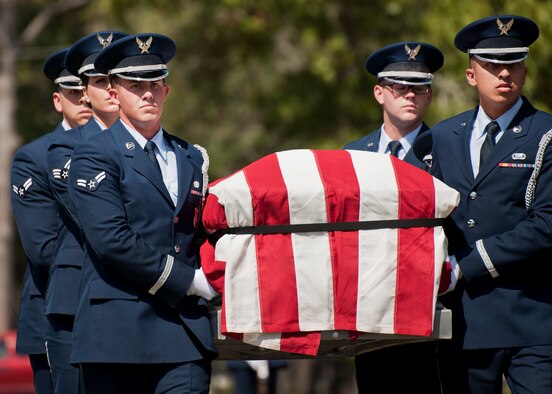 Members of the Eglin Air Force Base Honor Guard carry a casket during the unit’s graduation ceremony June 15. Approximately 12 new Airmen graduated from the 80-plus-hour course. The graduation performance includes flag detail, rifle volley, pall bearers and bugler for friends, family and unit commanders. (U.S. Air Force photo/Samuel King Jr.)