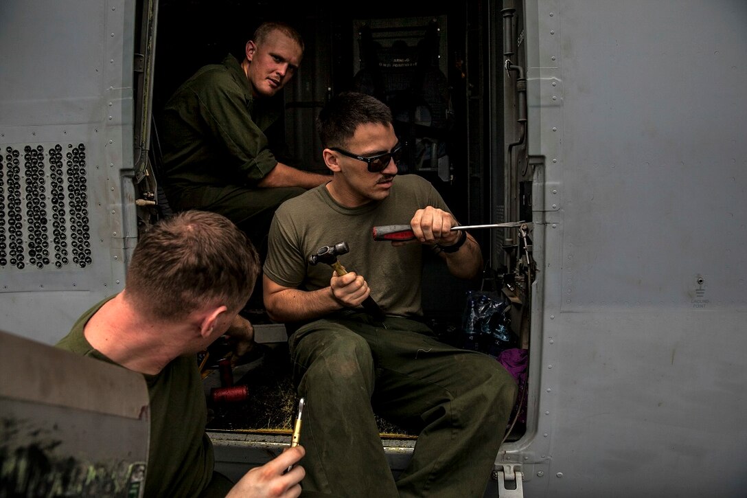 NAIROBI, Kenya (July 20, 2015) U.S. Marines with the "Greyhawks" of Marine Medium Tiltrotor Squadron 161 (Reinforced), 15th Marine Expeditionary Unit, spend time maintaining their MV-22B Osprey. The Marines are in Kenya to support President Barrack Obama's upcoming visit. The "Greyhawks" are the aviation combat element of the 15th MEU which is embarked on the Essex Amphibious Ready Group and deployed to maintain regional security in the U.S. 6th Fleet area of operations. (U.S. Marine Corps photo by Cpl. Elize McKelvey/Released)