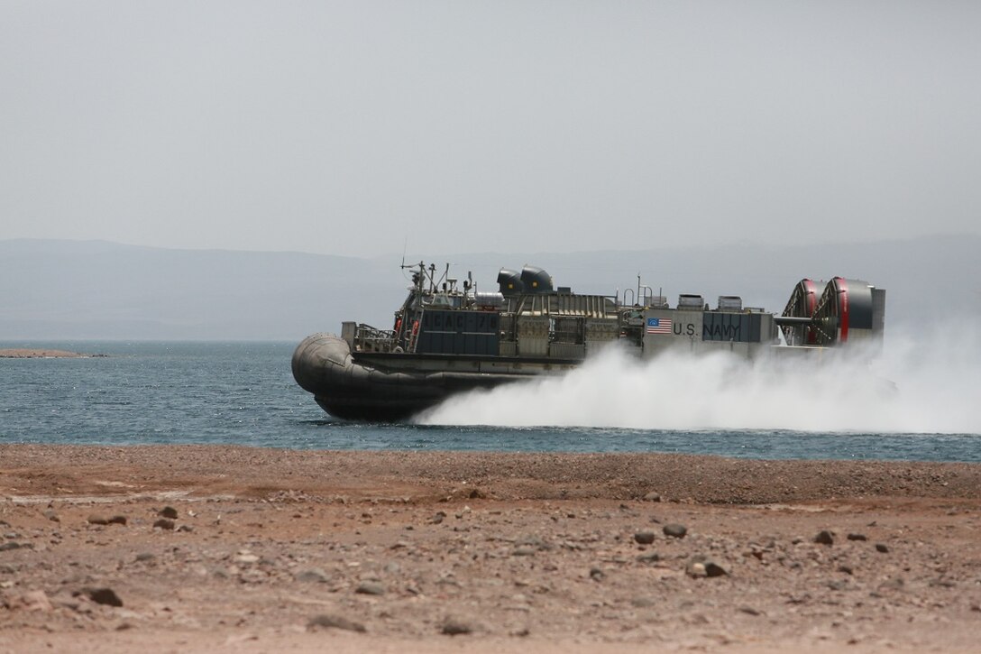 ARTA BEACH, DJIBOUTI (July 21, 2015) A U.S. Navy landing craft, air cushion transports U.S. Marines and equipment ashore to Arta Beach from the amphibious transport dock ship USS Anchorage (LPD 23). Elements of the 15th Marine Expeditionary Unit are ashore in Djibouti for sustainment training to maintain and enhance the skills they developed during their pre-deployment training period. The 15th MEU is currently deployed conducting maritime security operations in the 5th and 6th Fleet areas of responsibility. (U.S. Marine Corps photo by Sgt. Steve H. Lopez/Released)