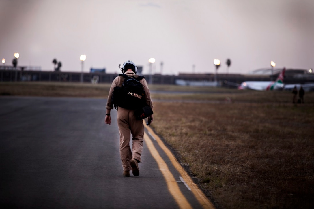 NAIROBI, Kenya (July 24, 2015) A U.S. Marine with the “Greyhawks” of Marine Medium Tiltrotor Squadron 161 (Reinforced), 15th Marine Expeditionary Unit (MEU), walks on the flight line of Jomo Kenyatta International Airport after supporting Marine Helicopter Squadron One (HMX-1) during President Obama’s visit to Nairobi July 25, 2015. Elements of the 15th MEU, based out of Camp Pendleton, California, and embarked aboard the Essex, are conducting naval operations in the 6th Fleet areas of operation in support of U.S. national security interests in Europe and Africa. (U.S. Marine Corps photo by Cpl. Elize McKelvey/Released)