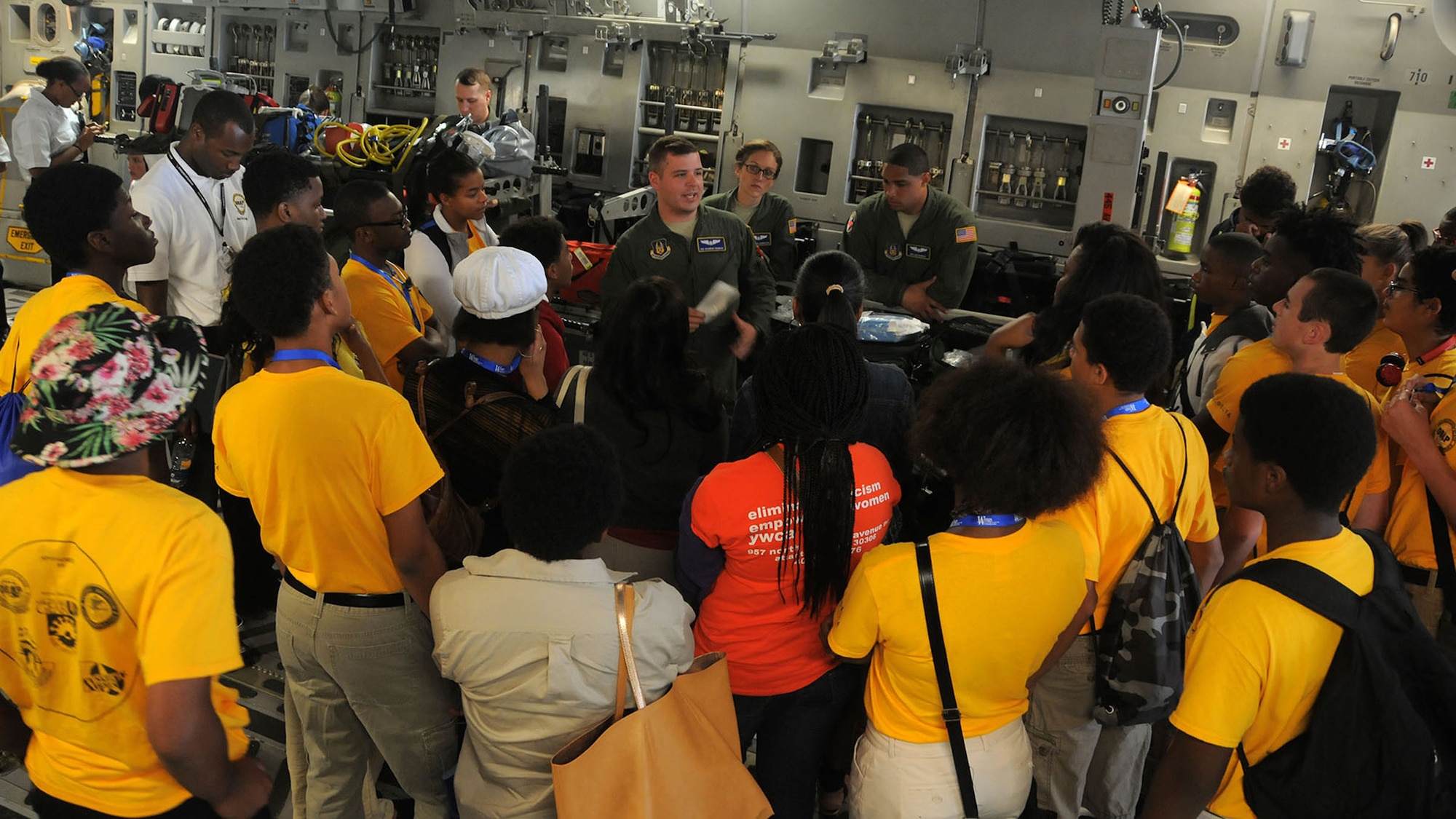 445th Aeromedical Evacuation Squadron AE technician Senior Airman Brandon Croghan talks with Dream Flight participants about the role of AES in the Air Force Reserve during their visit to the 445th Airlift Wing July 22, 2015. More than 180 students ages 14-18 and their chaperons visited the wing as part of the 16th Annual Delta Airlines sponsored Dream Flight program. (U.S. Air Force photo/Tech. Sgt. Anthony Springer)