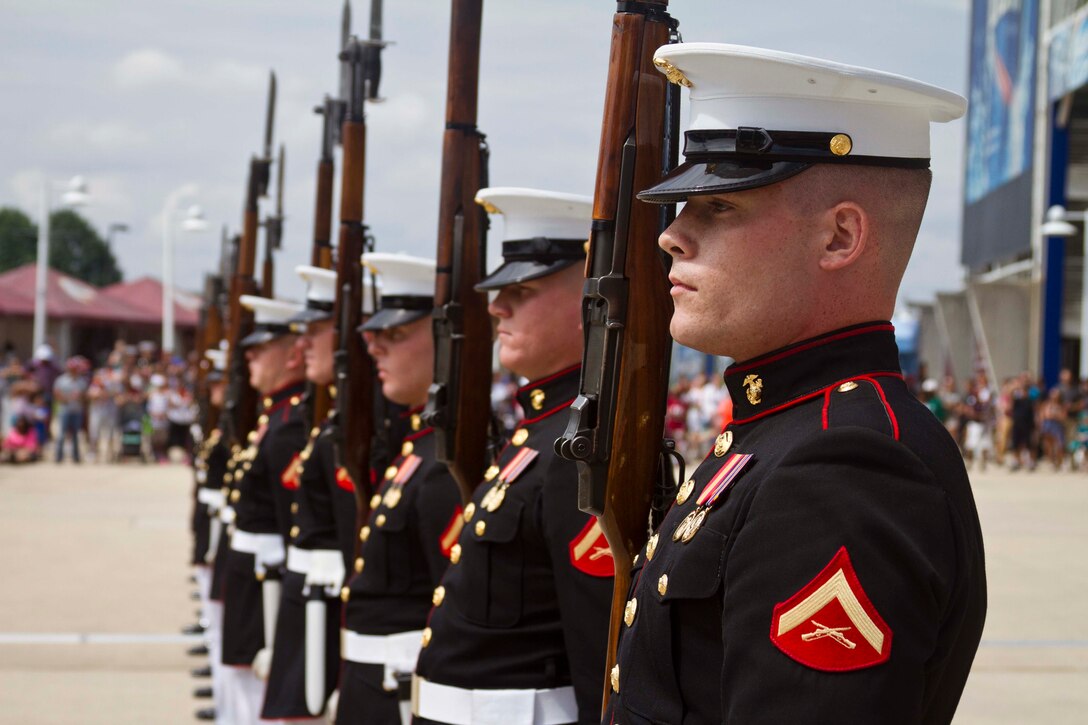 The United States Marine Corps Silent Drill Platoon performs at FedEx Field during the Washington Redskins’ Military Appreciation Day in Hyattsville, Maryland, July 11, 2015. The Silent Drill Platoon travels across the country and the world showcasing close-order drill and the precision for which the Marine Corps is known. (U.S. Marine Corps photo by Sgt. Bryan Nygaard/Released)