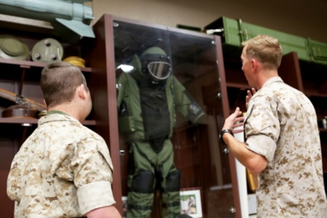 James Gallant, a young man diagnosed with brain cancer, tours the Explosive Ordnance Disposal library with Marines of 1st EOD Company, 1st Marine Logistics Group, aboard Camp Pendleton, Calif., July 25, 2015. Collaborating with the Make-A-Wish Foundation, 1st EOD helped James experience what being an EOD technician is like by giving him a tour through their library of ordnance and EOD tools, teaching him to operate the TALON bomb disposing robot and presenting him with his own desert utilities and EOD badge.
