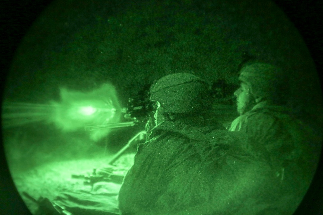 ARTA BEACH, Djibouti (July 22, 2015) U.S. Marines with Battalion Landing Team 3rd Battalion, 1st Marine Regiment, 15th Marine Expeditionary Unit, fire an M240B medium machine gun during a night-fire exercise.  The Marines of BLT 3/1 executed a series of attack and maneuver drills consisting of, machine gun, squad and night attacks.  Elements of the 15th Marine Expeditionary Unit are ashore in Djibouti for sustainment training to maintain and enhance the skills they developed during their pre-deployment training period.  The 15th MEU is currently deployed in support of maritime security operations and theater security cooperation efforts in the U.S. 5th and 6th Fleet areas of operation. (U.S. Marine Corps photo by Sgt. Jamean Berry/Released)