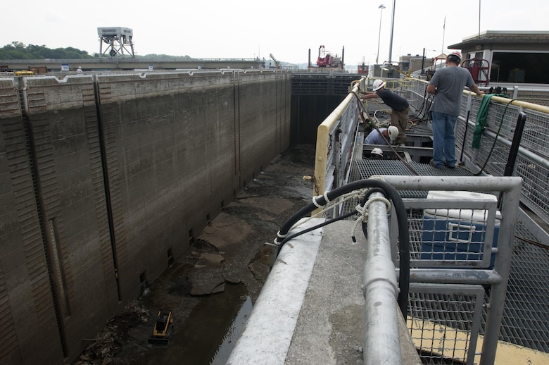 A U.S. Army Corps of Engineers Nashville District maintenance crew works on mechanical equipment July 27, 2015 at Old Hickory Lock in Old Hickory, Tenn.  The lock is empty of water until Aug. 4, 2015 while maintenance crews inspect the lock chamber and perform scheduled maintenance.  The lock is located on the Cumberland River at mile 216.2.
