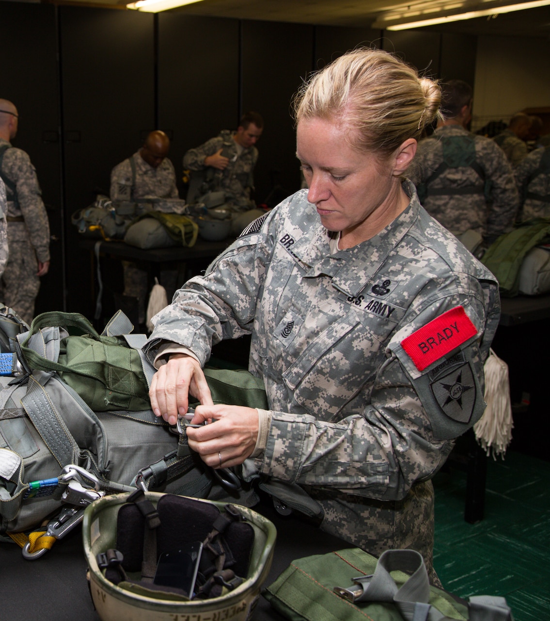 U.S. Army Sgt. Maj. Kristie Brady prepares for an airborne jump with the Joint Communications Support Element, an airborne communications unit headquartered at MacDill Air Force Base, Fla. Brady, who serves as a jumpmaster within JCSE, was recently selected as the first female command sergeant major of another airborne communications unit -- the 112th Special Operations Signal Battalion headquartered at Fort Bragg, N.C. Joint Communications Support Element photo by Rick Maupin