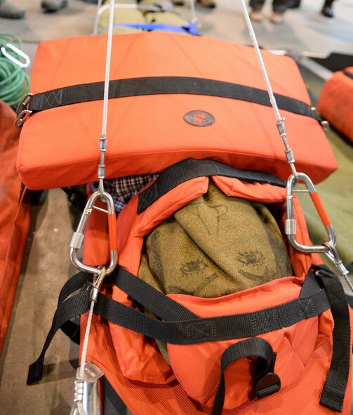 A sand-bag body lays on a stokes litter for a demonstration at Tachikawa Air Base, Japan, July 16, 2015. The litter and rescue hoist are used with the UH1-J helicopter for rescue operations. (U.S. Air Force photo by Airman 1st Class Elizabeth Baker/Released)