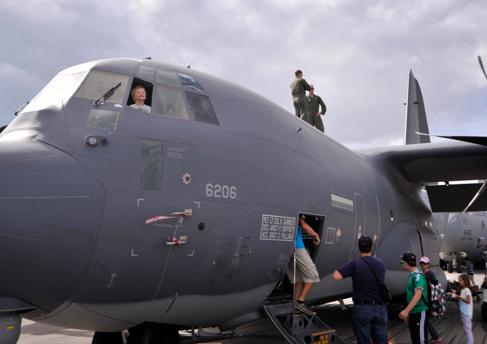 Lucas Idwanczuk, 4, looks out of a C-130 Hercules July 25, 2015, in Lethbridge, Alberta province, Canada. The aircraft participated in the 2015 Lethbridge International Airshow as a static display where spectators could see the inside of the aircraft and talk to the crews who operate it. (U.S. Air Force photo by Airman 1st Class Christian Clausen/Released)