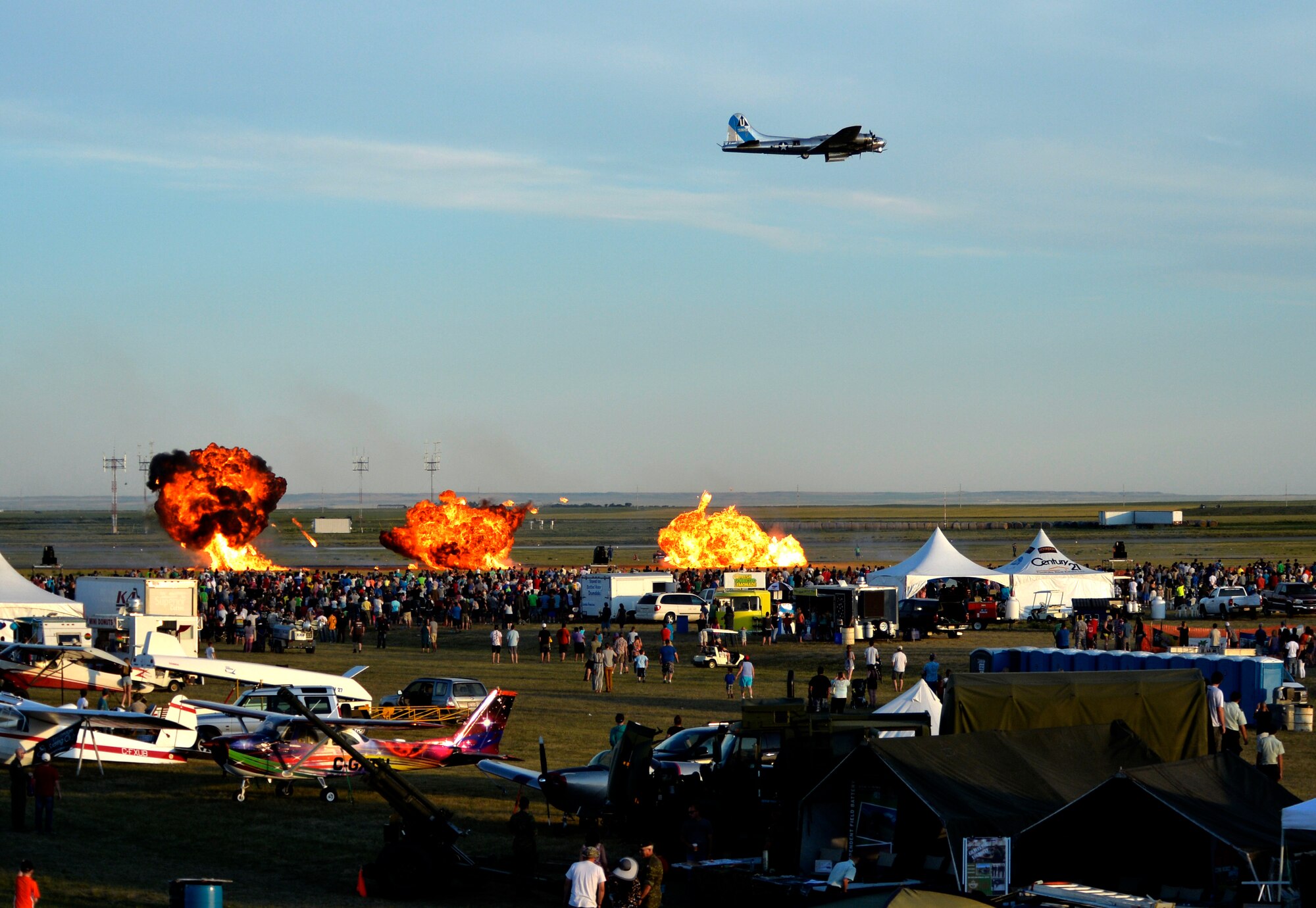 A B-17 Flying Fortress drops pyrotechnics at the 2015 Lethbridge International Airshow July 24, 2015, in Lethbridge, Alberta province, Canada. The airshow featured static displays of the MQ-1 Predator, F-18 Hornet, B-17 Flying Fortress, C-130 Hercules, C-17 Globemaster, C-5M Super Galaxy, and more. (U.S. Air Force photo by Airman 1st Class Christian Clausen/Released)