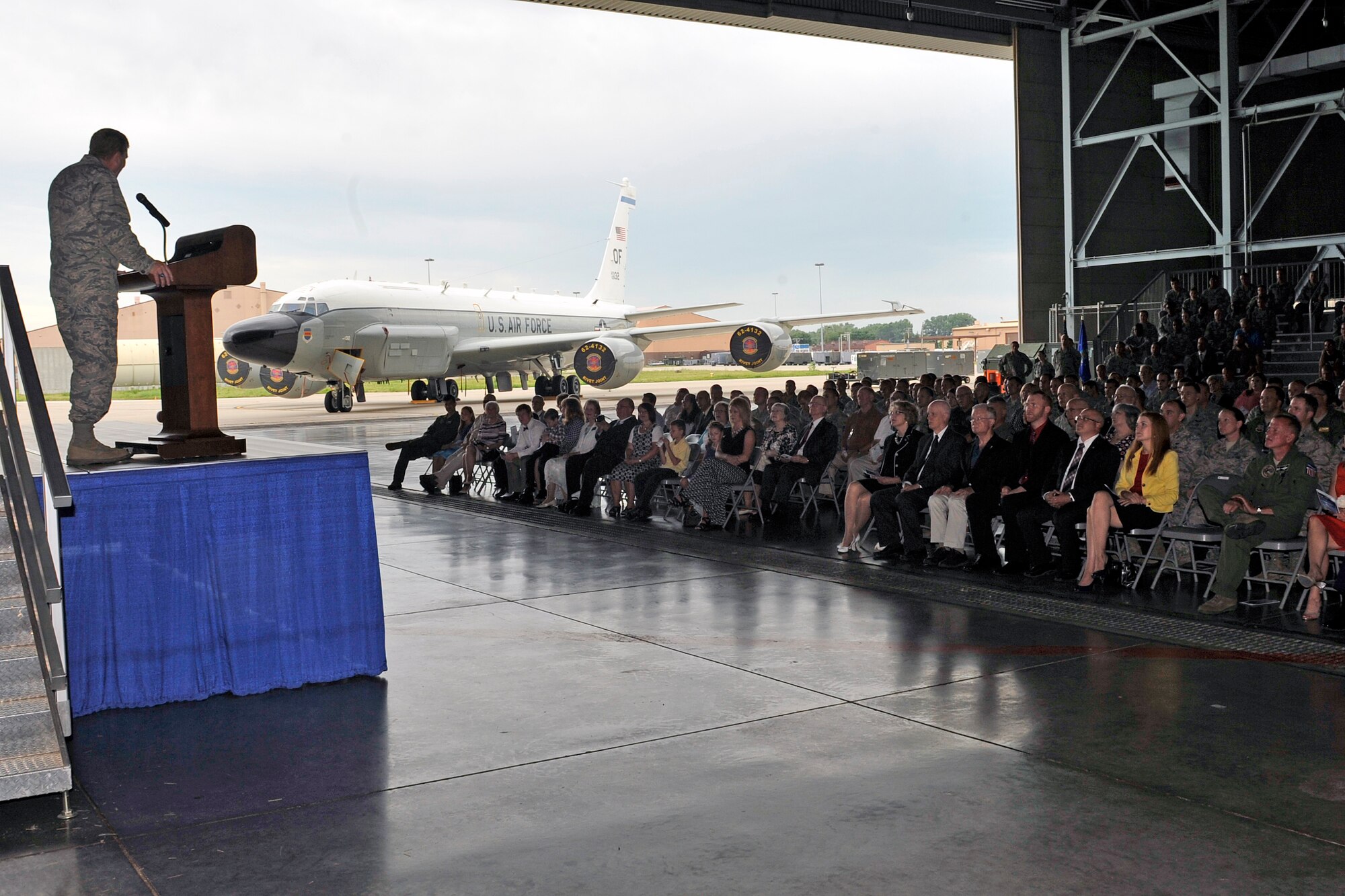 U.S. Air Force Col. Clayton Seale addresses Team Offutt and visiting guests after assuming command of the 55th Maintenance Group at a ceremony held inside the Benny L. Davis Maintenance Facility July 27, 2015 at Offutt Air Force Base, Nebraska. (U.S. Air Force photo by Jeff Gates/Released)