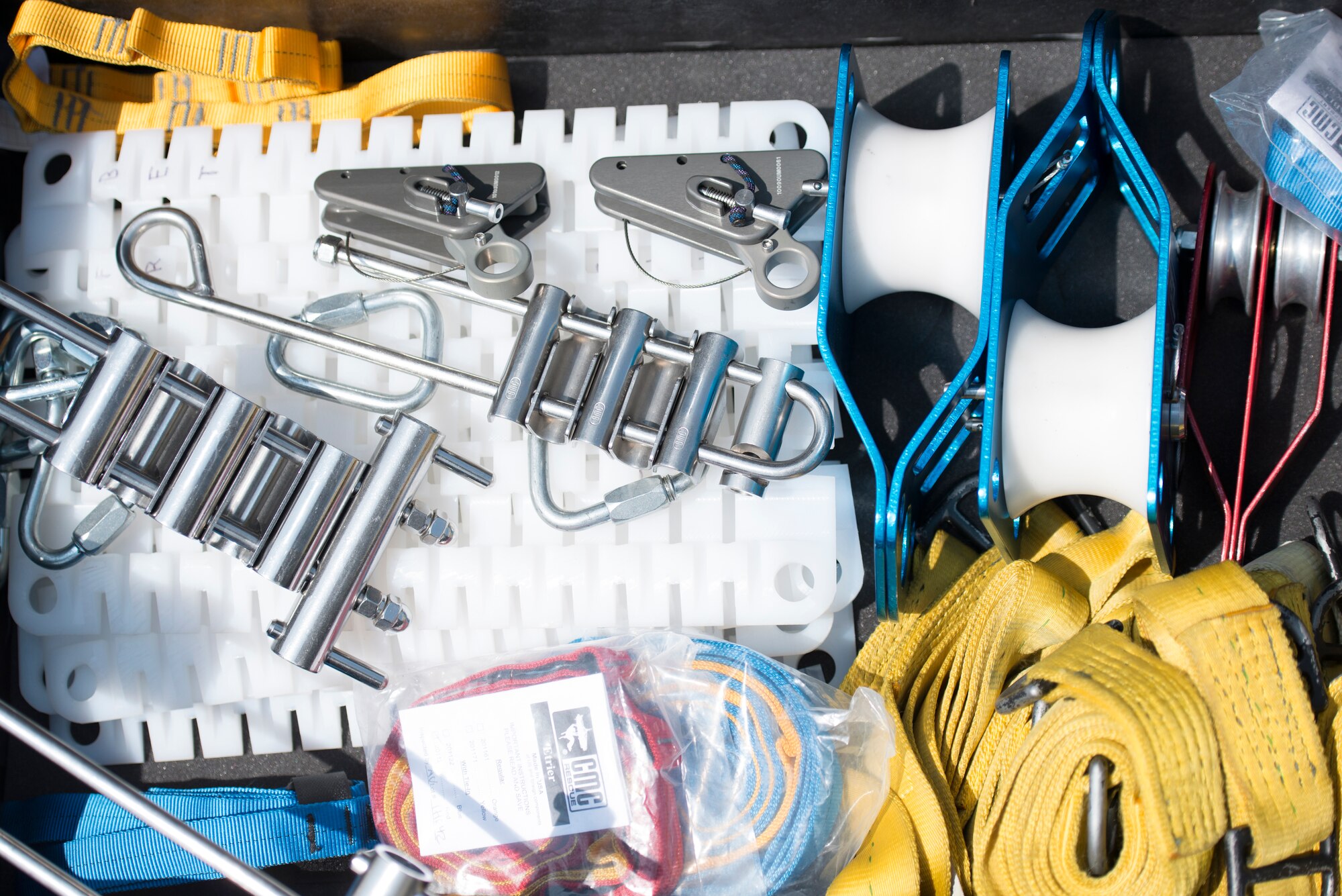 Assorted rappelling gear sits in a bin for use by the 5th Civil Engineer Squadron at Minot Air Force Base, N.D., July 9, 2015. Members of the 5th CES practiced rappelling as a portion of a rope rescue class provided to Airmen to prepare them to enter confined spaces. (U.S. Air Force photo/ Airman 1st Class Justin T. Armstrong)
