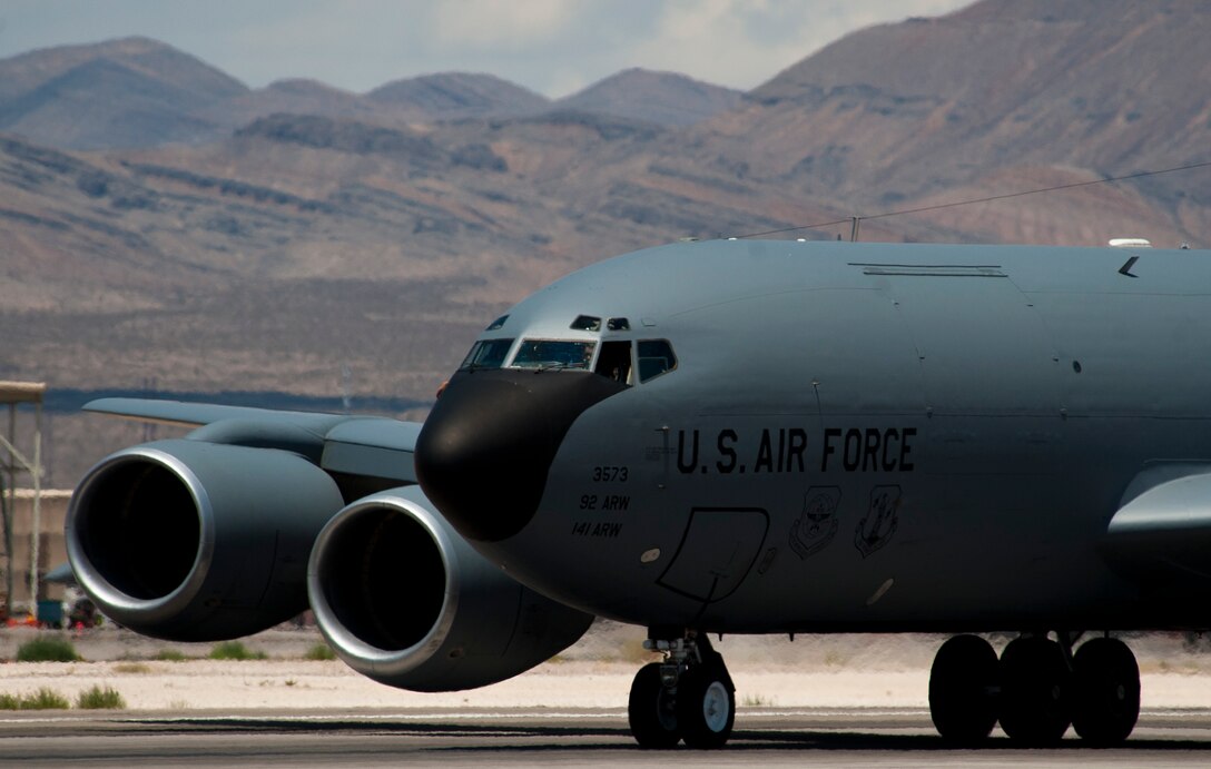 A KC-135 Stratotanker assigned to the 92nd Air Refueling Wing, Fairchild Air Force Base, Wash., taxis down the runway during Red Flag 15-3 at Nellis AFB, Nev., July 21, 2015. The KC-135’s role in Red Flag is to refuel other aircraft in mid-air thus extending their flight time in the mission area. (U.S. Air Force photo by Senior Airman Thomas Spangler)
