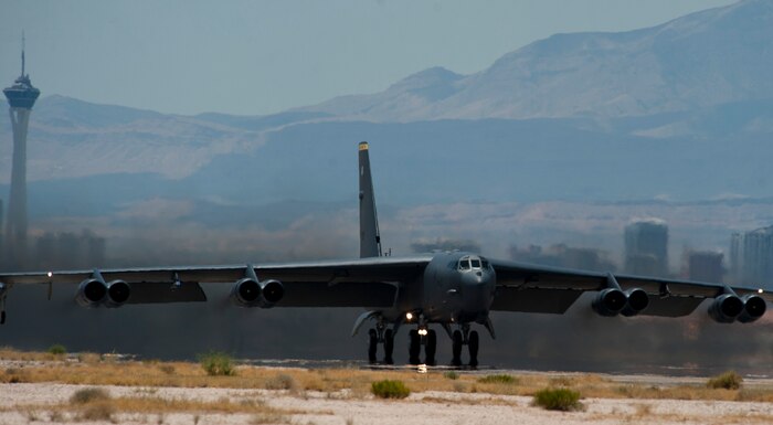 A B-52 Stratofortress assigned to the 69th Bomb Squadron, Minot Air Force Base, N.D., takes off during Red Flag 15-3 at Nellis AFB, Nev., July 21, 2015. The exercise takes place over the 12,000-square-nautical mile Nevada Test and Training Range which provides a realistic arena for operational testing and training aircrews to improve combat readiness. (U.S. Air Force photo by Senior Airman Thomas Spangler)