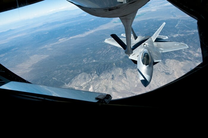 An F-22 Raptor from the 325th Fighter Squadron, Tyndall Air Force Base, Fla.,  makes an approach to refuel off the tail of a KC-135 Stratotanker assigned to the 344th Air Refueling Squadron, McConnell Air Force Base, Kan., during a Red Flag 15-3 training sortie over the Nevada Test and Training Range, July 24, 2015. The NTTR is the largest contiguous air and ground space available for peace time military operations in the free world, offering 5,000 square miles of air space and more than 1,200 targets and threat simulators. (U.S. Air Force photo by Senior Airman Joshua Kleinholz)