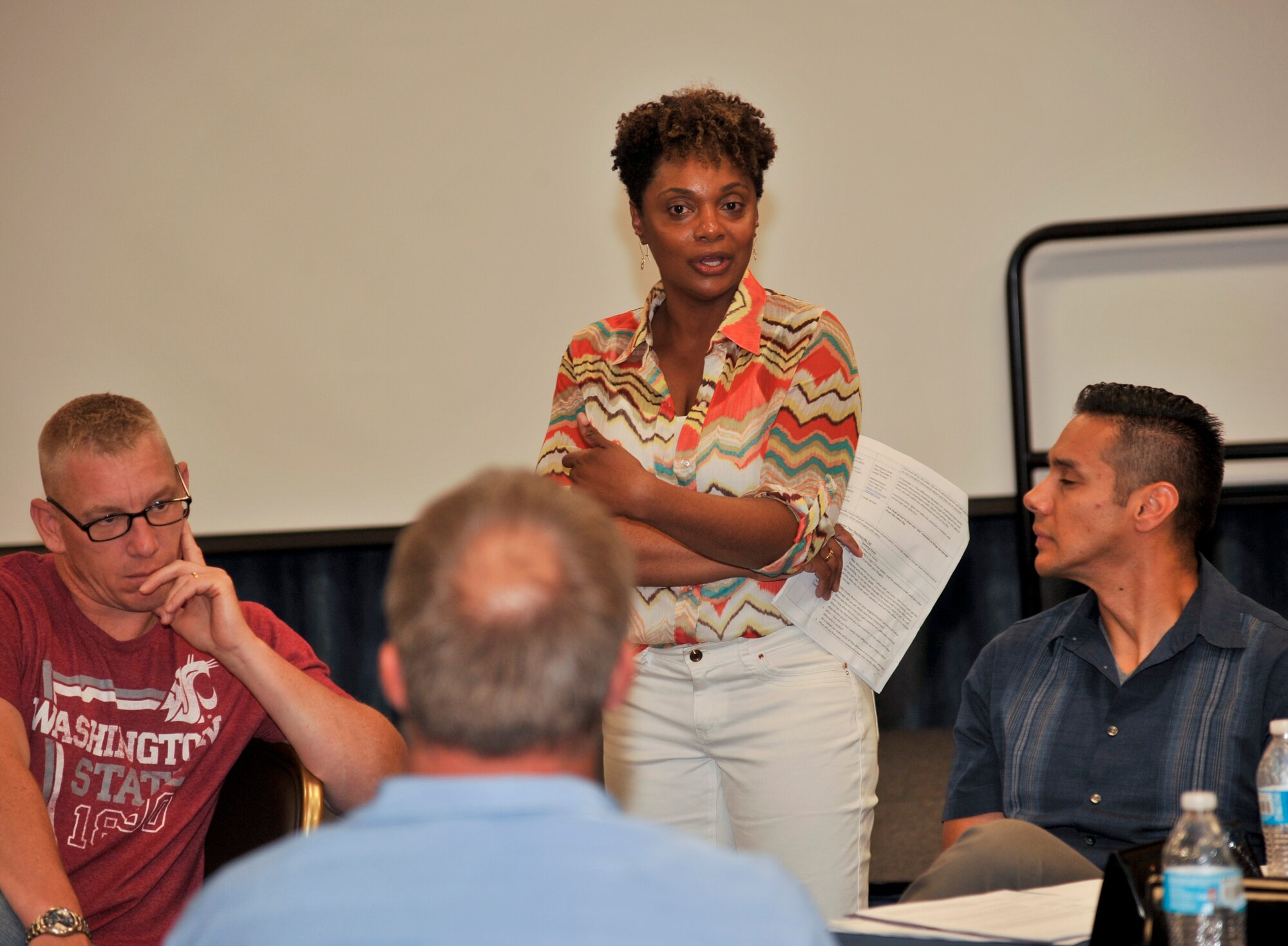 Senior Master Sgt. Daphne Soto, the 92nd Air Refueling Wing equal opportunity director, speaks with participants of the Let's Talk: Today's Social Issues seminar July 23, 2015 at Fairchild Air Force Base, Wash. One of the topics was race, what it is and how it is defined. Each participant had a different idea of what race meant to them. To some it was nationality, to others it was culture, or where and how they grew up. (U.S. Air Force photo/Airman 1st Class Taylor Bourgeous)