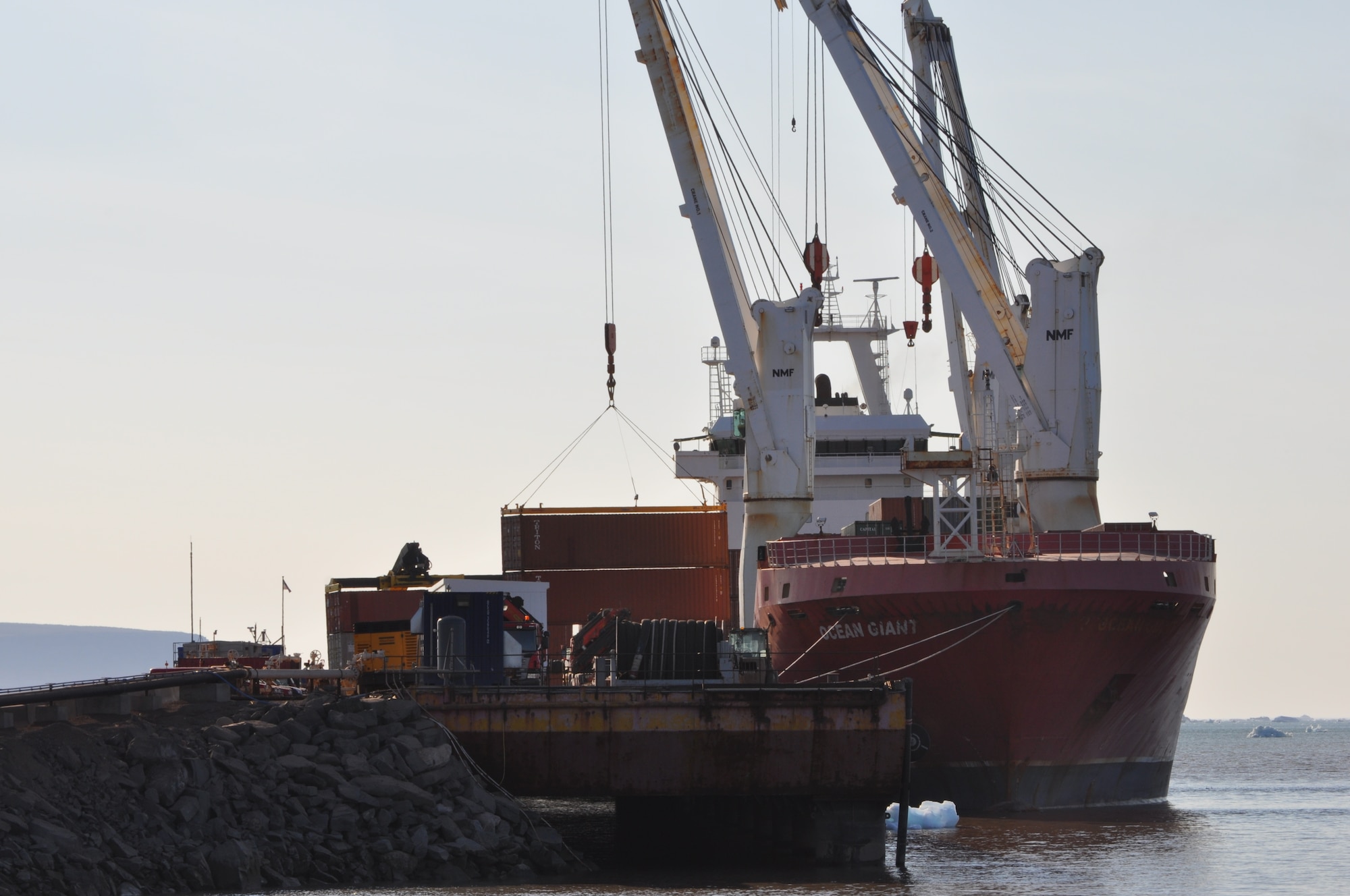 THULE AIR BASE, Greenland - The Ocean Giant cargo ship waits for cargo operations to begin at Thule Air Base on July 21, 2015.  The vessel is part of the annual Operation PACER GOOSE mission, which resupplies the U.S. military’s northernmost installation. (U.S. Air Force photo by Lt. Col. Stacy M. Clements)