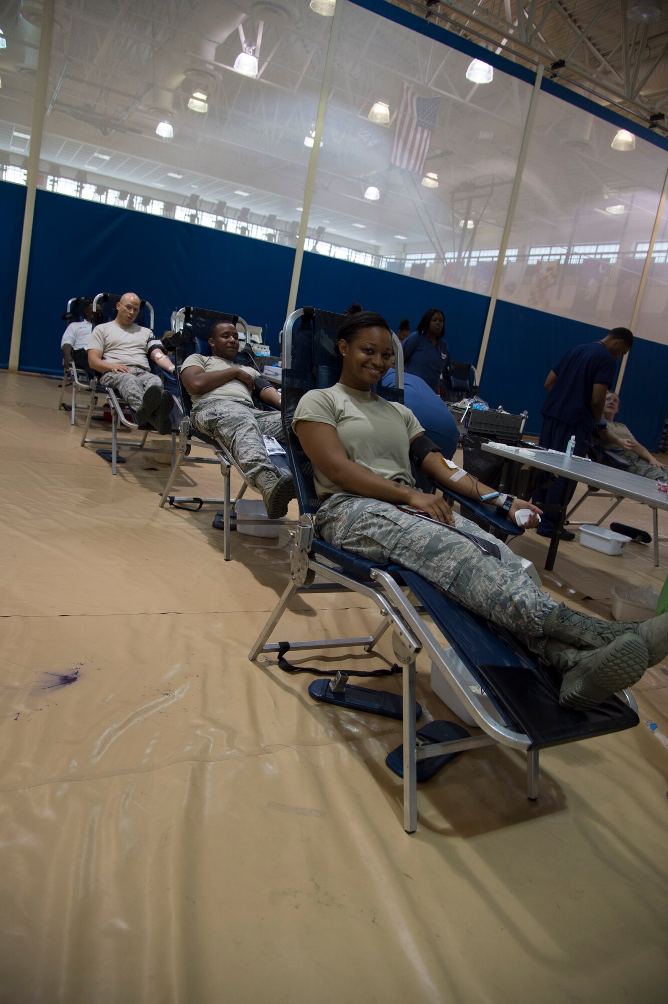 Airmen from the 824th Base Defense Squadron donate blood during a blood drive July 22, 2015, at Moody Air Force Base, Ga. Each donated pint of blood can potentially save up to three lives. To donate blood, volunteers completed a medical-history questionnaire and a short physical to ensure they were healthy enough to donate. (U.S. Air Force photo by Staff Sgt. Eric Summers Jr./Released)