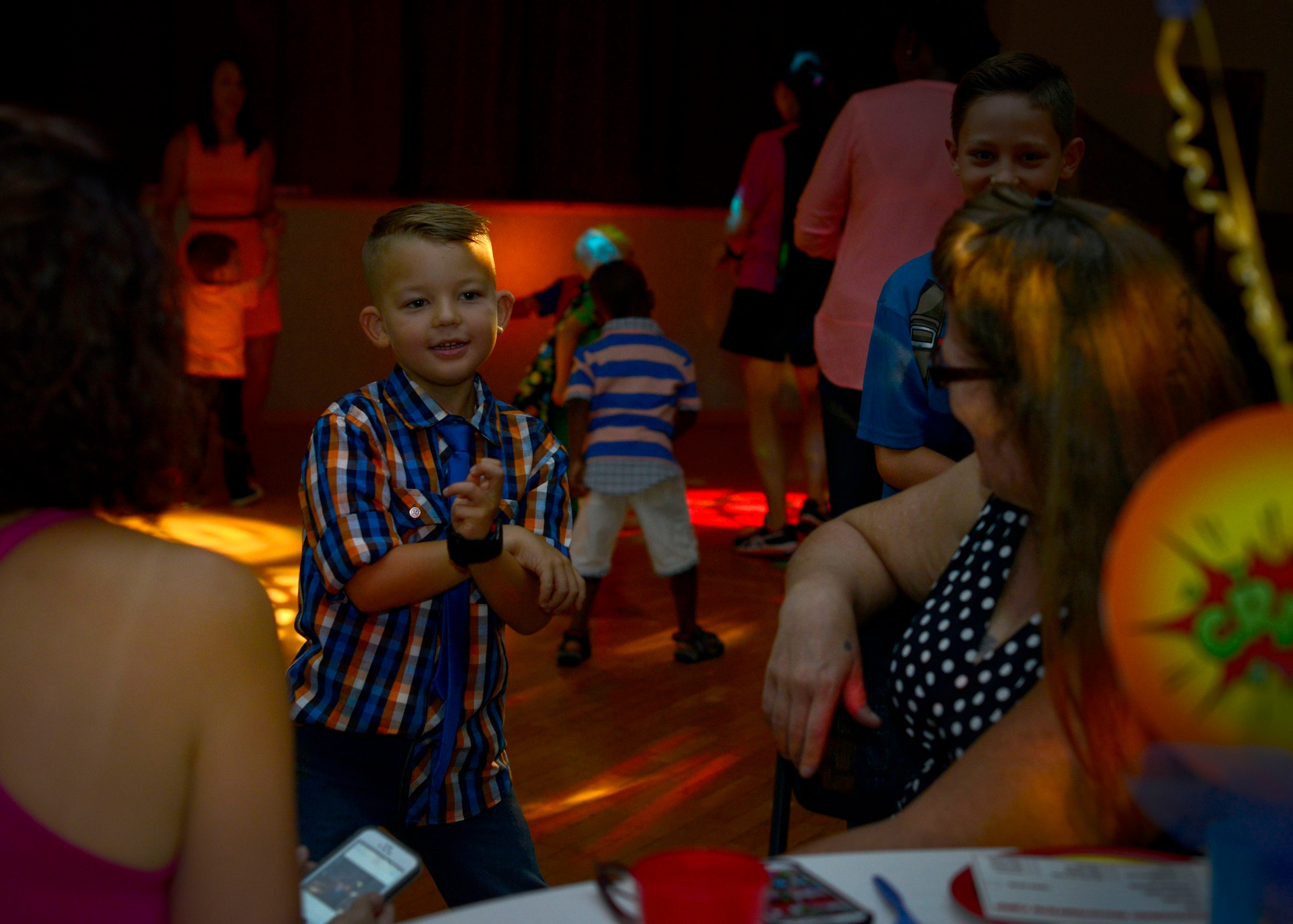 William Nelson, son of Michelle Nelson, dances during the first “Mother and Son dance,” July 25, 2015, at Aviano Air Base, Italy. More than 75 mother and son couples attended the event filled with food, music and games. (U.S. Air Force photo by Airman 1st Class Cary Smith/Released)