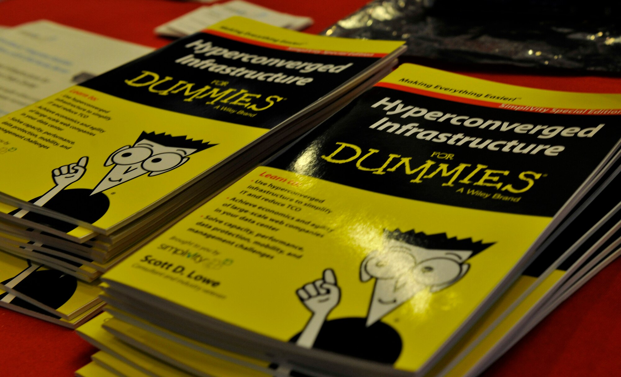 Hyperconverged Infrastructure for Dummies lay on the table at the booth for CDW-G, LLC, a provider of information technology solutions for federal government agencies, during the Armed Forces Communications-Electronics Association’s Technology Exposition July 21, 2015, at Ramstein Air Base, Germany. The purpose of the two- day expo was to provide a venue for Airmen and civilians to see firsthand the technology and capabilities available from various companies. (U.S. Air Force photo/Airman 1st Class Tryphena Mayhugh)