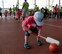 A child lines up his next shot in one of the games played during the St. Martin’s Special Children’s Day event July 22, 2015 at Spangdahlem Air Base, Germany. The event offers special needs children from local schools a chance to interact with the Saber Community. (US Air Force photo by Senior Airman Sarah Denewellis/Released)