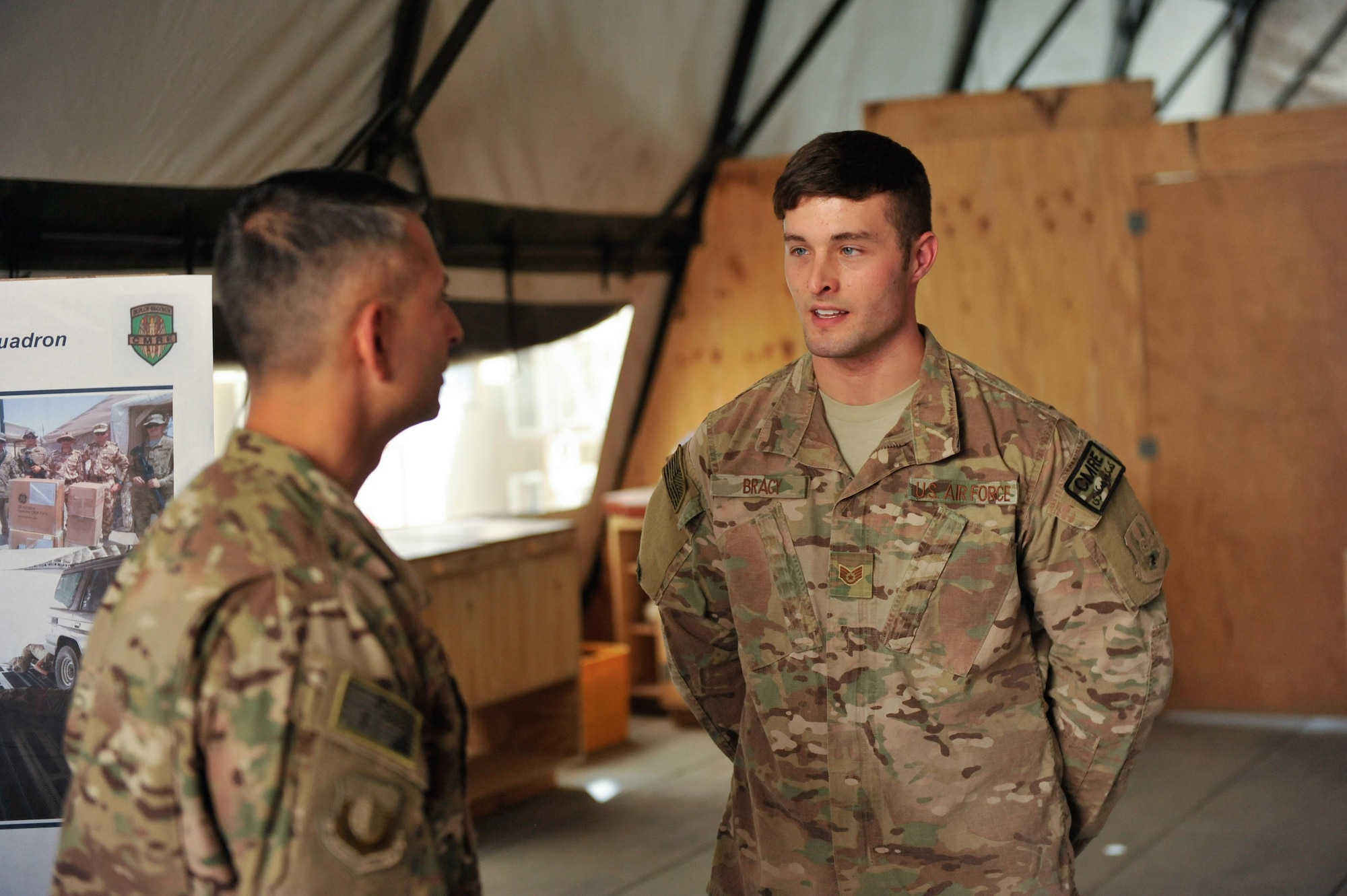 U.S. Air Force Brig. Gen. Dave Julazadeh, 455th Air Expeditionary Wing commander, talks with an Airman assigned to the 451st Air Expeditionary Group at Kandahar Airfield, July 25, 2015. The general and Chief Master Sgt. Matt Grengs, 455th AEW command chief met with Airmen from across the group who provide intelligence, surveillance and reconnaissance for U.S. and Coalition forces operating outside the wire while also operating one of the busiest airfields in the theater.  (U.S. Air Force photo by Maj. Tony Wickman/Released)