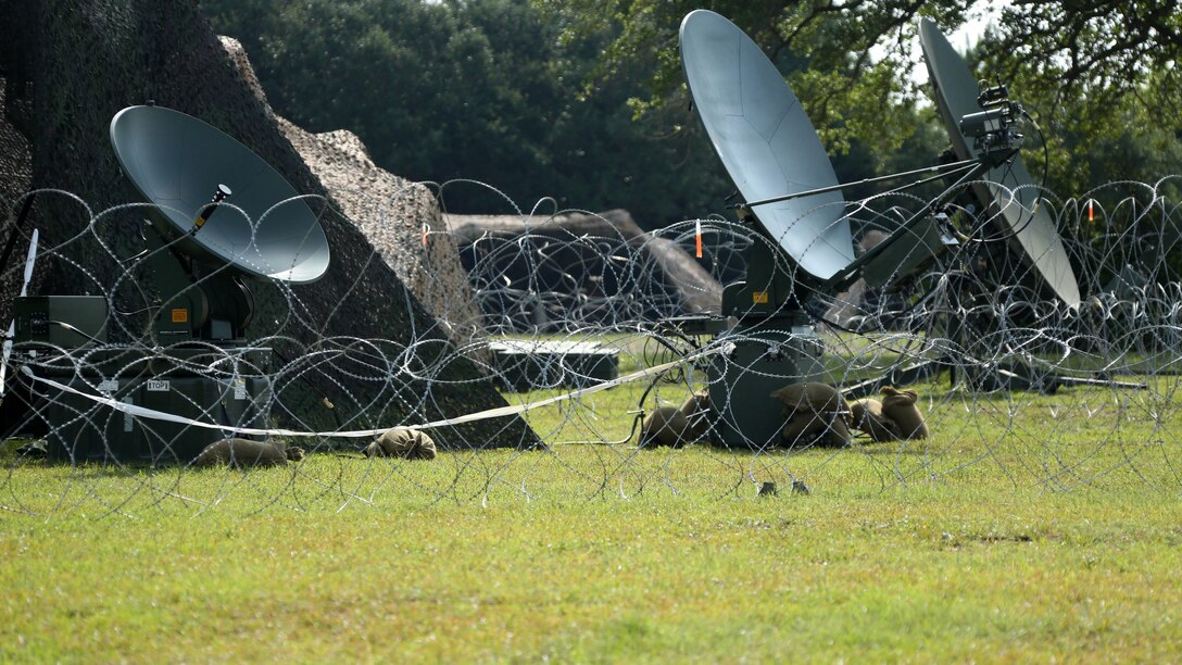 Satellite transmitters were set up during a training exercise at Marine Corps Auxiliary Landing Field Bogue, North Carolina, July 23, 2015. Marines with MWHS-2, Marine Wing Support Squadron 274 and Marine Wing Communications Squadron 28 gathered at the airfield for a training exercise to simulate a deployed environment.