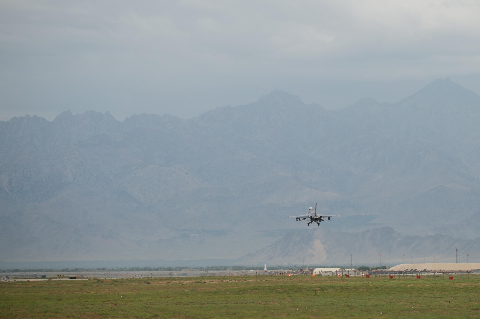 A U.S. Air Force F-16 Fighting Falcon “Triple Nickel” aircraft assigned to the 555th Expeditionary Fighter Squadron from Aviano Air Base, Italy, lands at Bagram Airfield, Afghanistan, July 29, 2015. The F-16 is a multi-role fighter aircraft that is highly maneuverable and has proven itself in air-to-air and air-to-ground combat. Members of the Triple Nickel are deployed in support of Operation Freedom’s Sentinel and NATO’s Resolute Support mission. (U.S. Air Force photo by Tech. Sgt. Joseph Swafford/Released)