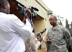 Army Lt. Col. Rodney Boyd, officer-in-charge of the U.S. MEDFLAG forces, is interviewed by local Ghanaian media following the exercise opening ceremony. The exercise will strengthen the relationship between the U.S. and Ghana through 10 days of collaborative training and sharing of medical expertise, as well as joint humanitarian civilian assistance in local communities.