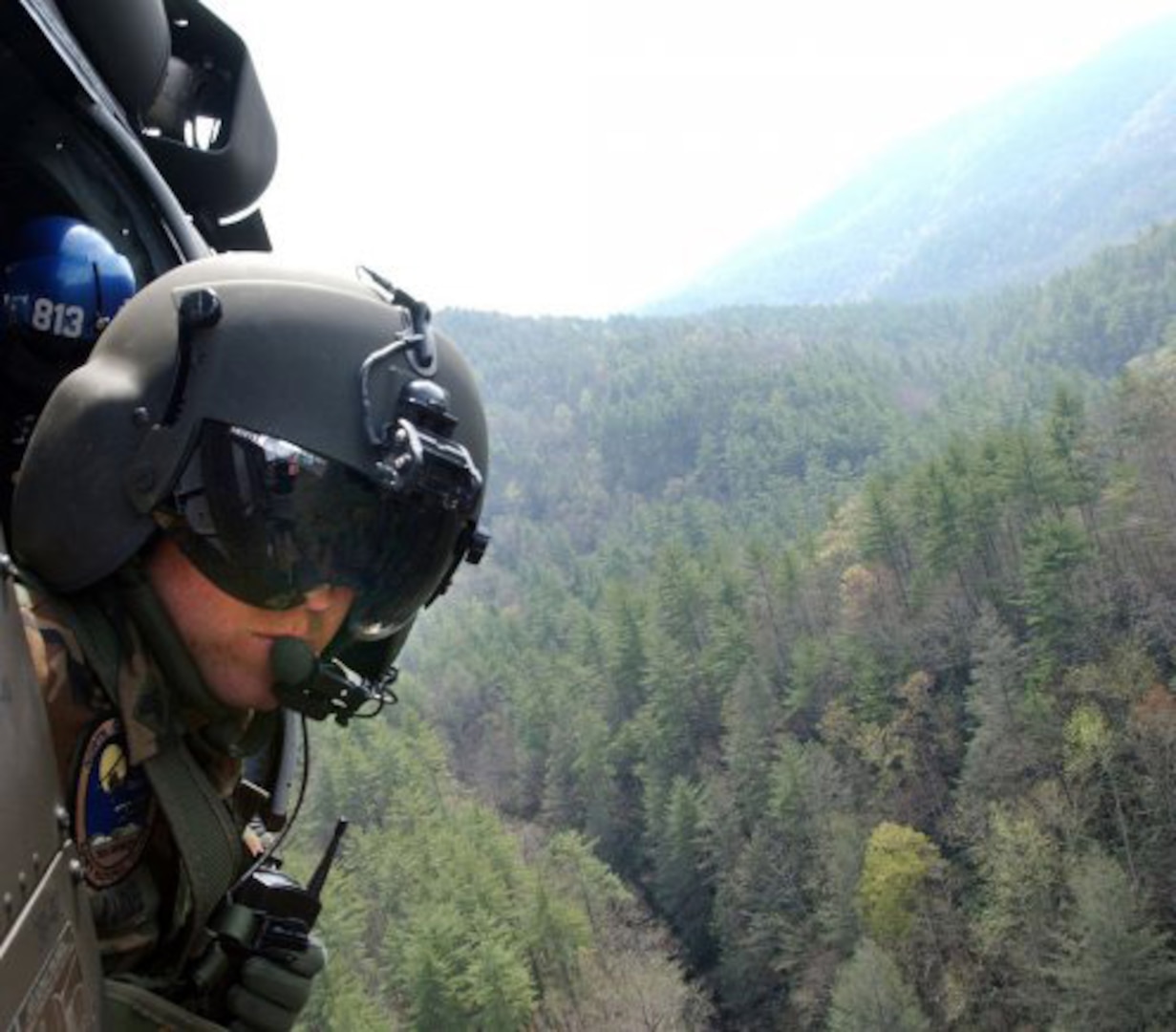 The Active Guard Reserve allows active-duty Soldiers to transfer to locations closer to home, where their skills can be put to good use. Here, a Soldier from the North Carolina Army National Guard peers from a UH-60 Black Hawk during a recent search and rescue exercise near Morganton, N.C.