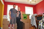 New York Army Natonal Guard Majs. Brian Bonanno  and Amy Bonanno   at their home in Clifton Park, New York, July 20, 2015, as they pack for a move to South Africa. The two veterans, both staff officers in the New York Army National Guard’s 42nd Infantry Division, are heading with their two children to Pretoria, South Africa, where Brian will be the liaison officer for the New York Army National Guard and South Africa State Partnership Program. 