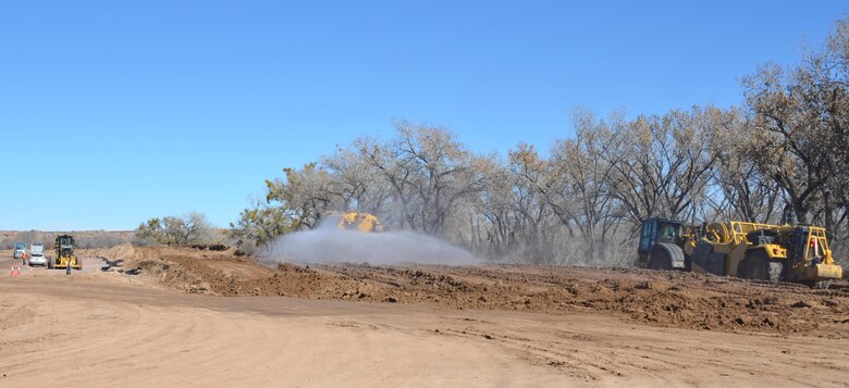 SOCORRO, N.M. -- The contractor works on the San Acacia Levee along the Rio Grande, Feb. 25, 2015.