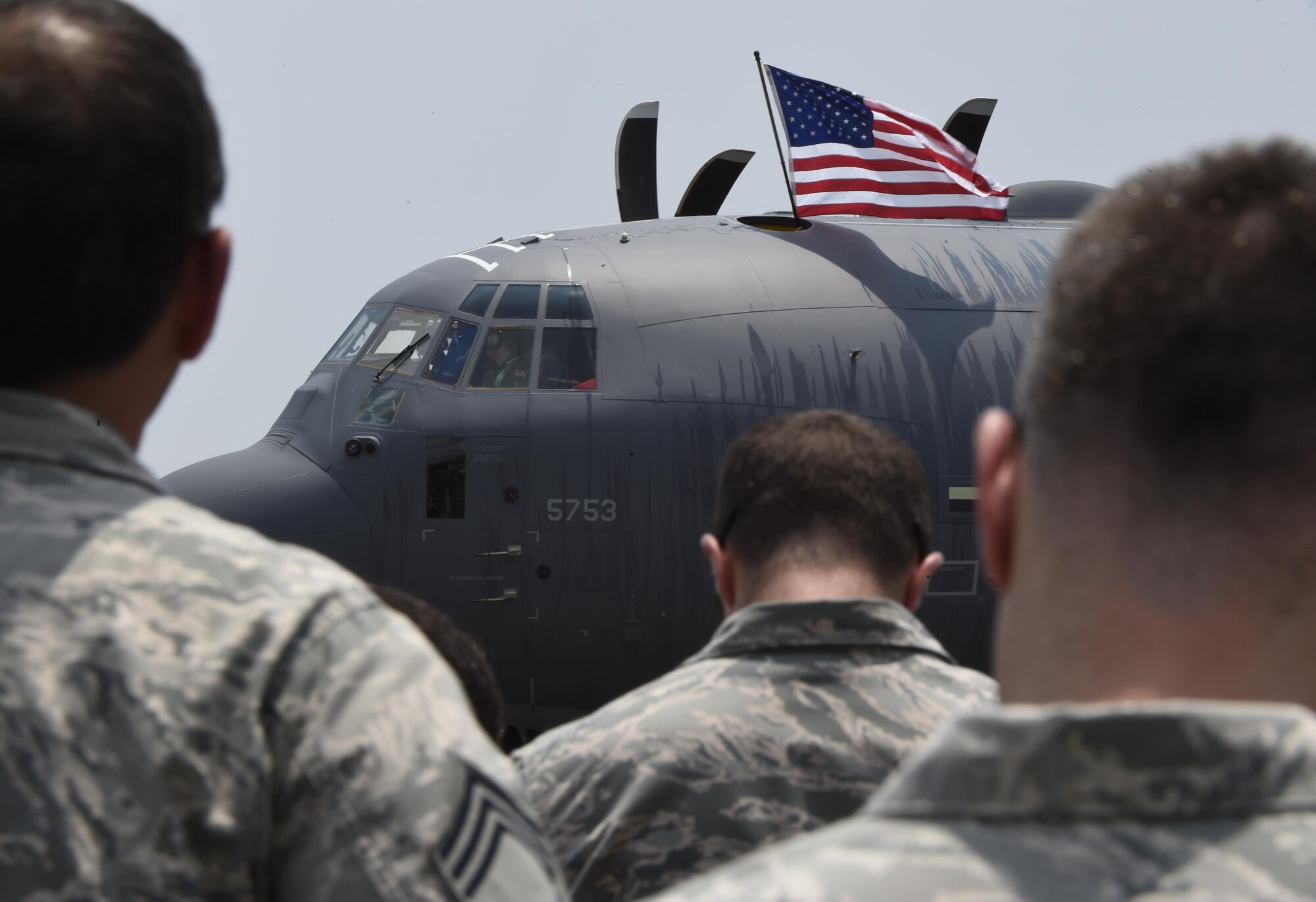 Hurlburt Airmen watch the arrival of the AC-130J Ghostrider at Hurlburt Field, Fla., July 29, 2015. The 1st Special Operations Wing accepted delivery of Air Force Special Operations Command’s first AC-130J that will be flown by the 1st Special Operations Group Detachment 2 and maintained by the 1st Special Operations Aircraft Maintenance Squadron. (U.S. Air Force photo by Airman Kai White/Released)