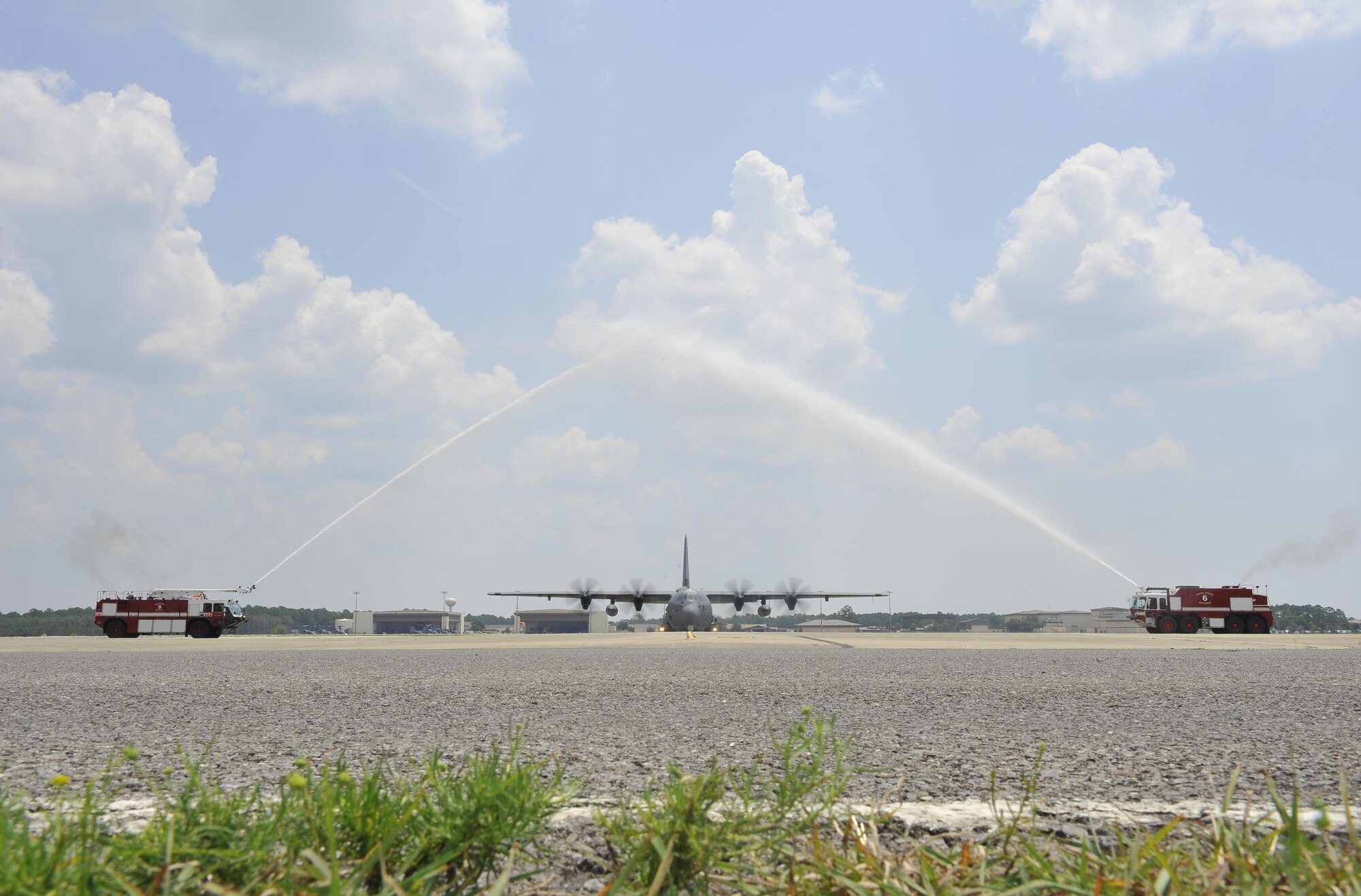 Air Force Special Operations Command’s first AC-130J Ghostrider taxis under a water arch at Hurlburt Field, Fla., July 29, 2015. The AC-130J recently completed its initial developmental test and evaluation at Eglin Air Force Base, Fla., and will begin operational tests and evaluation by Airmen with the 1st Special Operations Group Detachment 2 and 1st Special Operations Aircraft Maintenance Squadron later this year. (U.S. Air Force photo by Airman Kai White/Released)