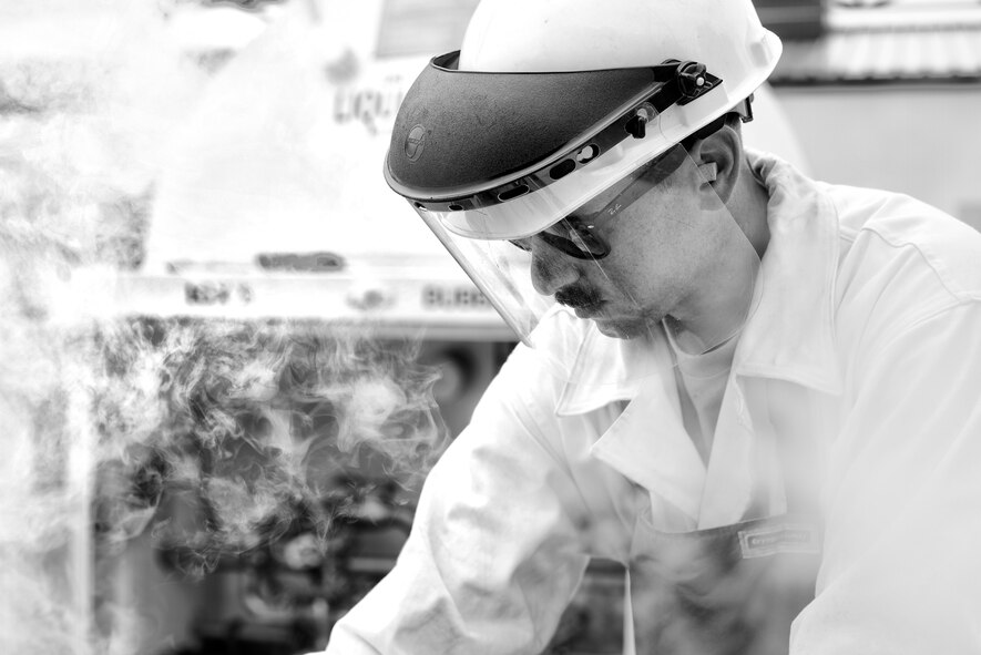 Senior Airman William Oppenheim, 374th Logistics Readiness Squadron fuels mobility support technician, issues liquid oxygen to a LOX cart July 29, 2015, at Yokota Air Base, Japan. After each LOX cart is filled, it is then transported onto the flightline to ensure the pilots have enough oxygen to accomplish their mission. (U.S. Air Force photo by Airman 1st Class Delano Scott/Released)