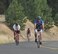 A group of bicyclists complete their second loop of a 15.7 mile bike ride during a triathlon at Clear Lake, Wash., July 25, 2015. More than 30 athletes participated in this year’s triathlon. (U.S. Air Force photo/Staff Sgt. Samantha Krolikowski)