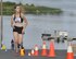 Tori Belfils begins the 3.2 mile run portion of a triathlon at Clear Lake, Wash. July 25, 2015. Athletes could participate in the triathlon individually or on a three person team. (U.S. Air Force photo/Staff Sgt. Samantha Krolikowski)