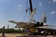 Students from the 362nd Training Squadron simulate removing an F-15 Eagle 
from a runway using a wire rope sling and a 55 ton crane in the Crash
Damaged Disabled Aircraft Recovery unit at Sheppard Air Force Base, Texas
July 29, 2015. The aircraft had previously experienced landing gear failure
and is now used as a trainer for students the CDDAR course.  (U.S. Air Force
photo by Danny Webb/Released)
